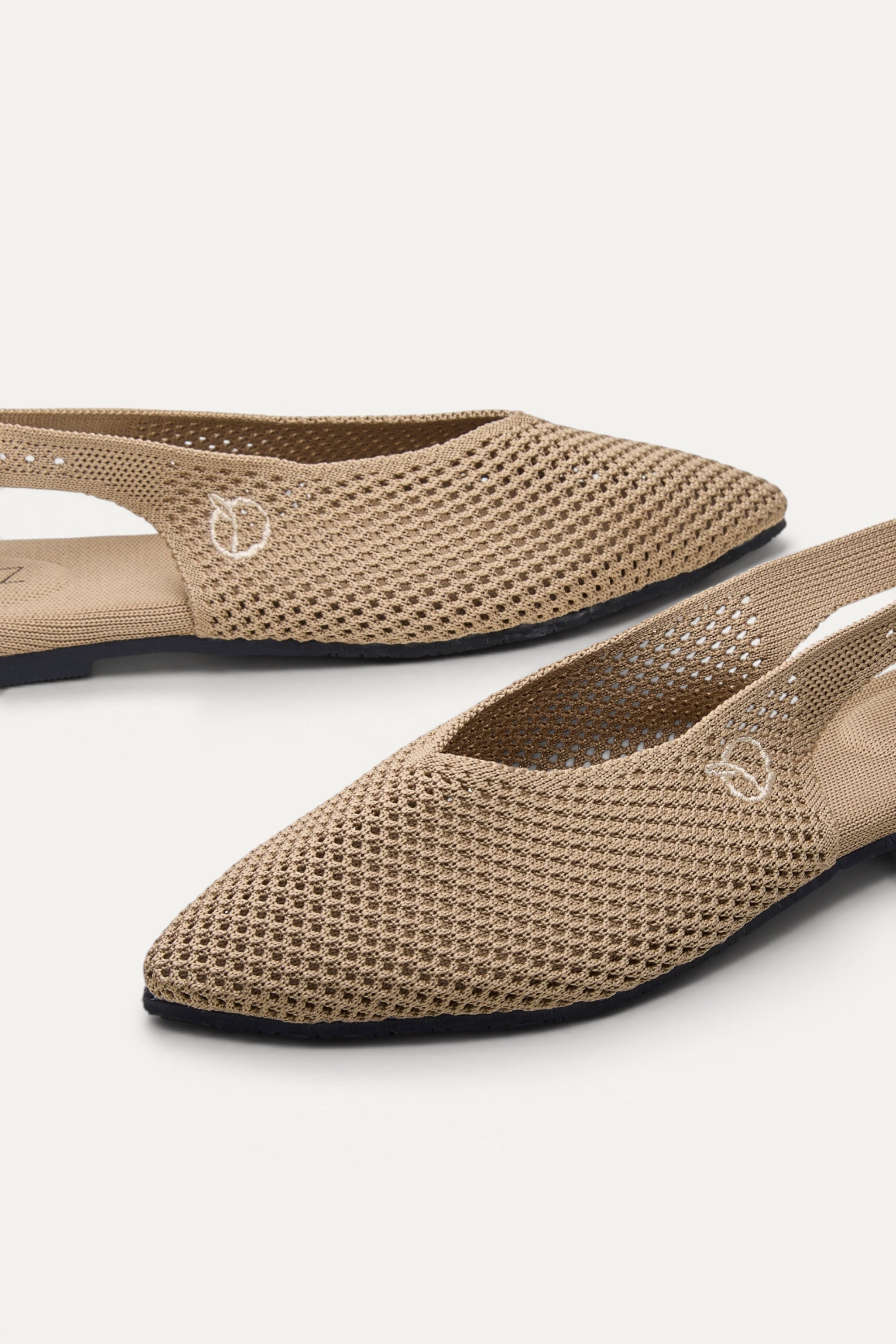 Top view of Rioz Airknit Slingbacks (sand, pointed-toe), lightweight knit flats from rPET bottles.