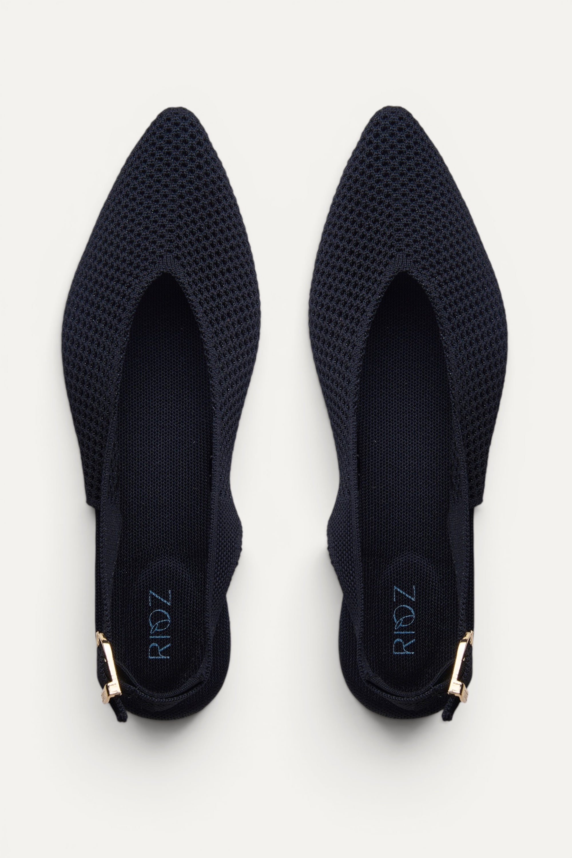 Rioz Airknit Slingbacks in black, vegan pointed-toe knit flats from recycled PET bottles, made in India.