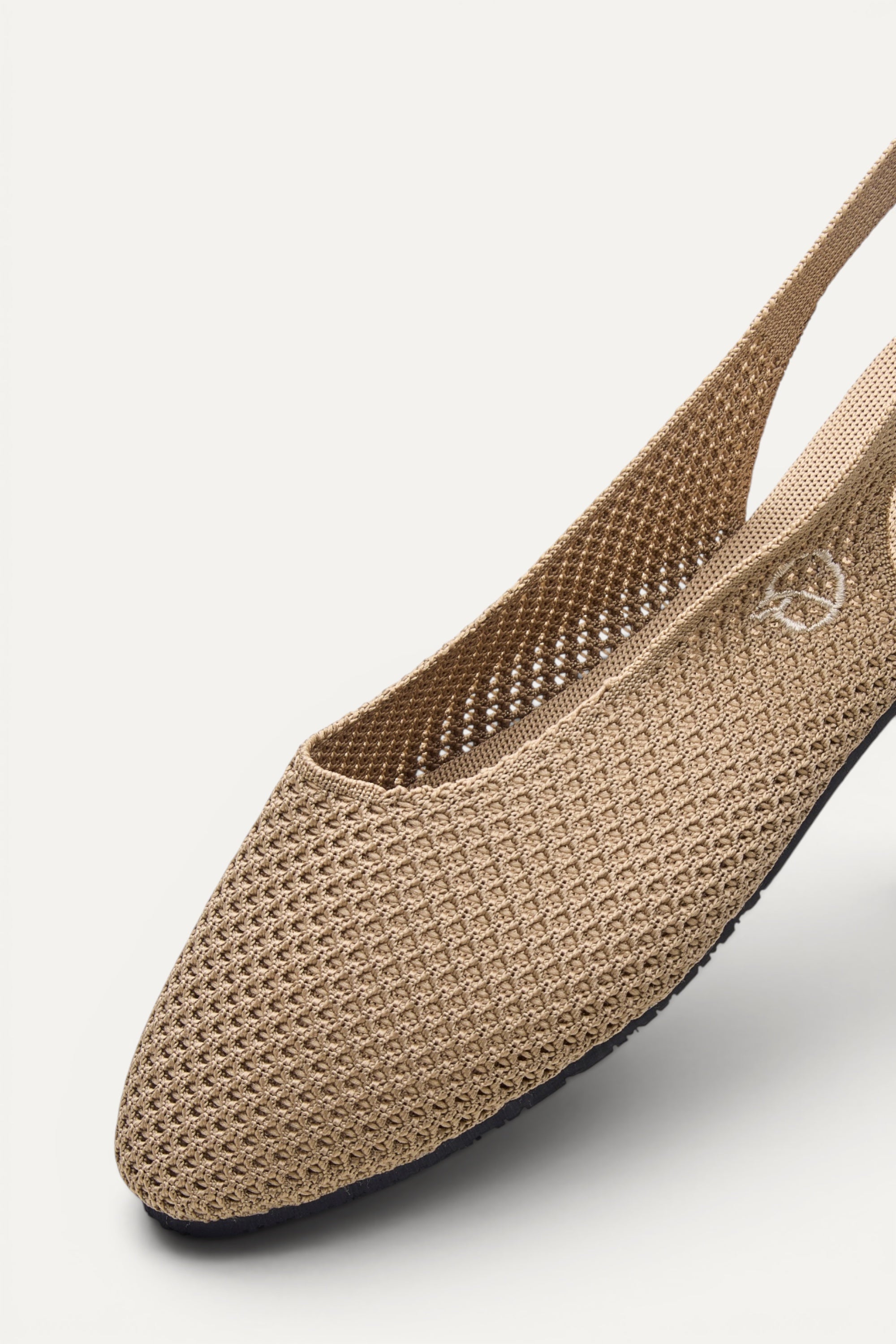 Top view of Rioz Airknit Slingbacks (sand, almond-toe), lightweight knit flats made in India from rPET.