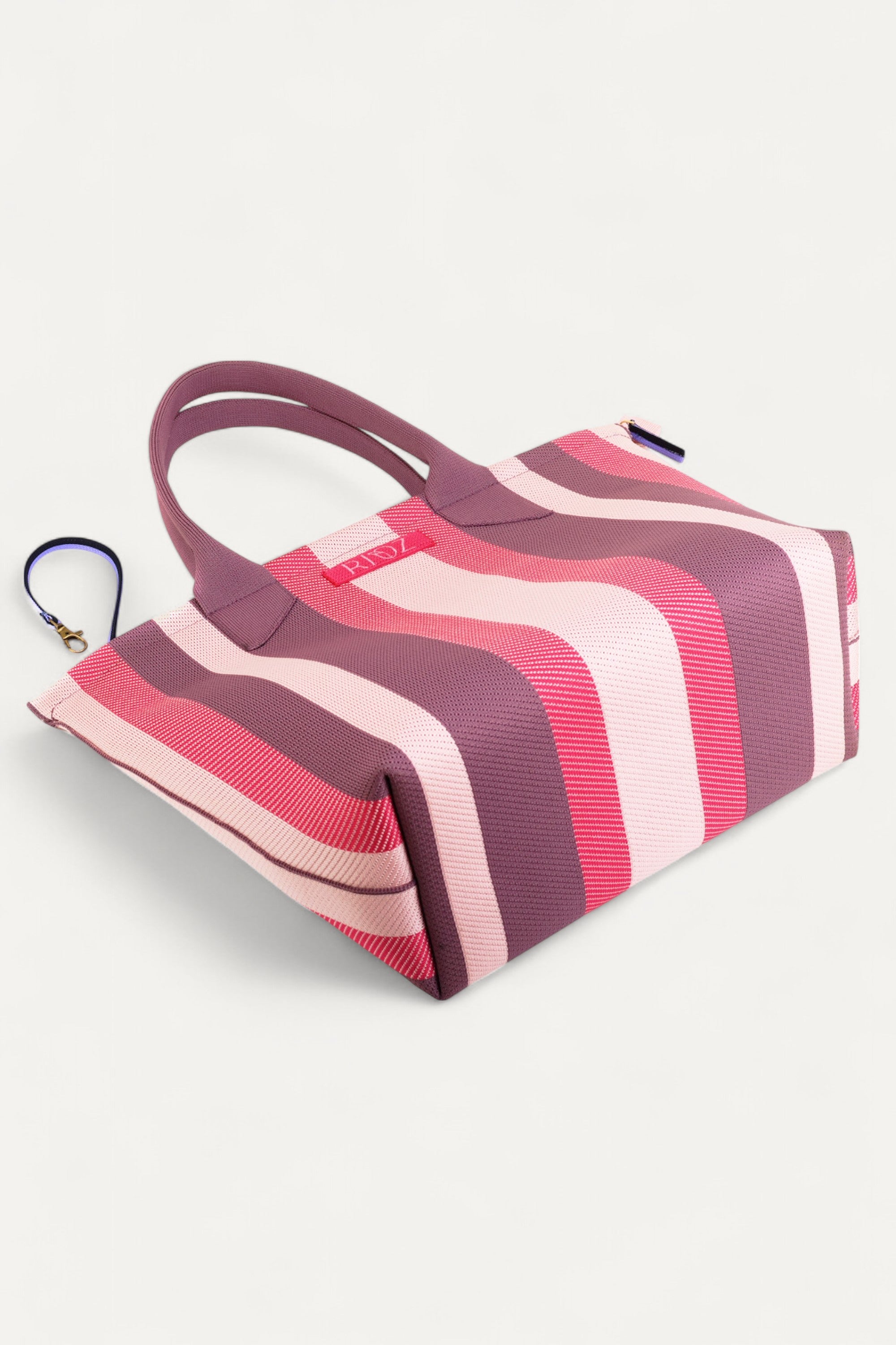 RIOZ-Eco-friendly zipper tote bag for women—sustainable, spacious, and made from recycled materials, ideal for everyday use and conscious living