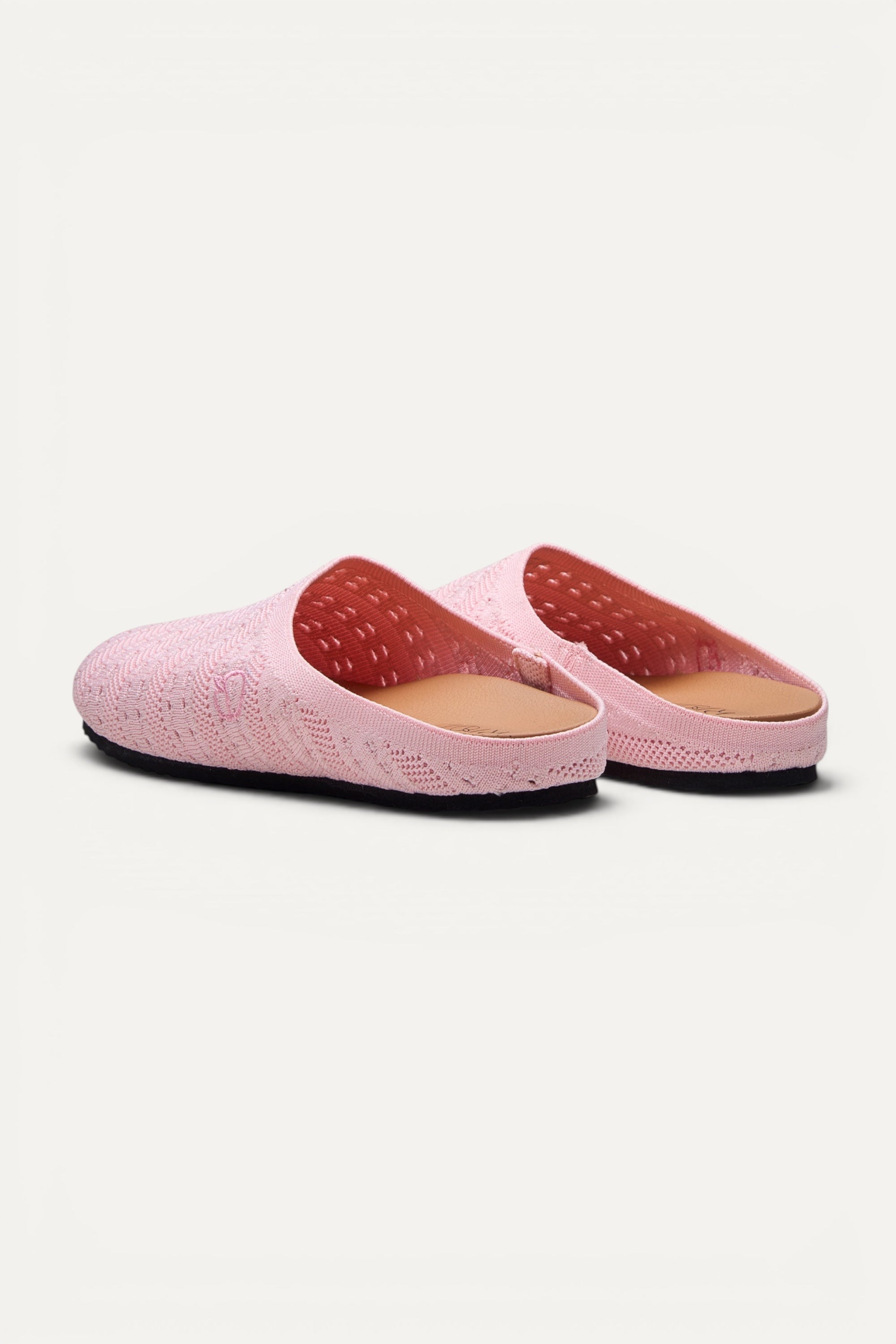 Pink Rioz Lumi Mules — vegan slip-on knit clogs for casual weekends and errands, machine washable.