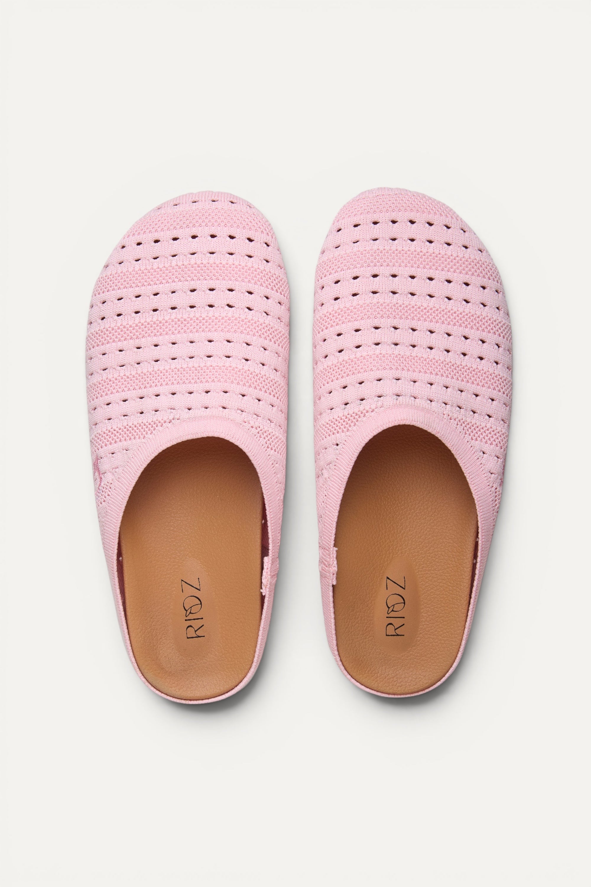 Rioz Lumi Mules in pink, vegan closed-toe knit clogs from 10 recycled PET bottles, made in India.