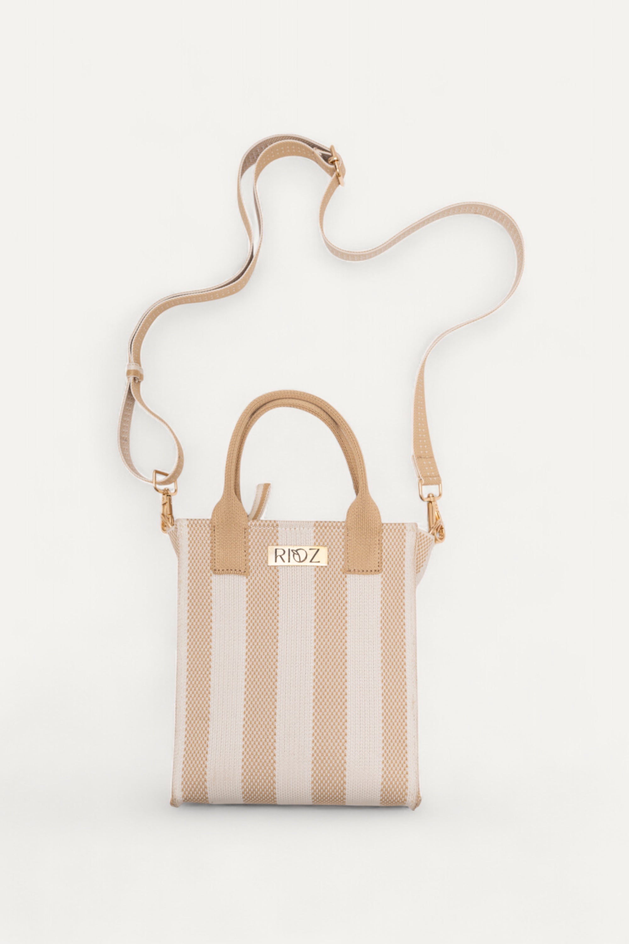 Midday Mini tote bag in ivory and wheat stripes by Rioz – compact, eco-friendly and lightweight, with adjustable crossbody strap for everyday essentials.