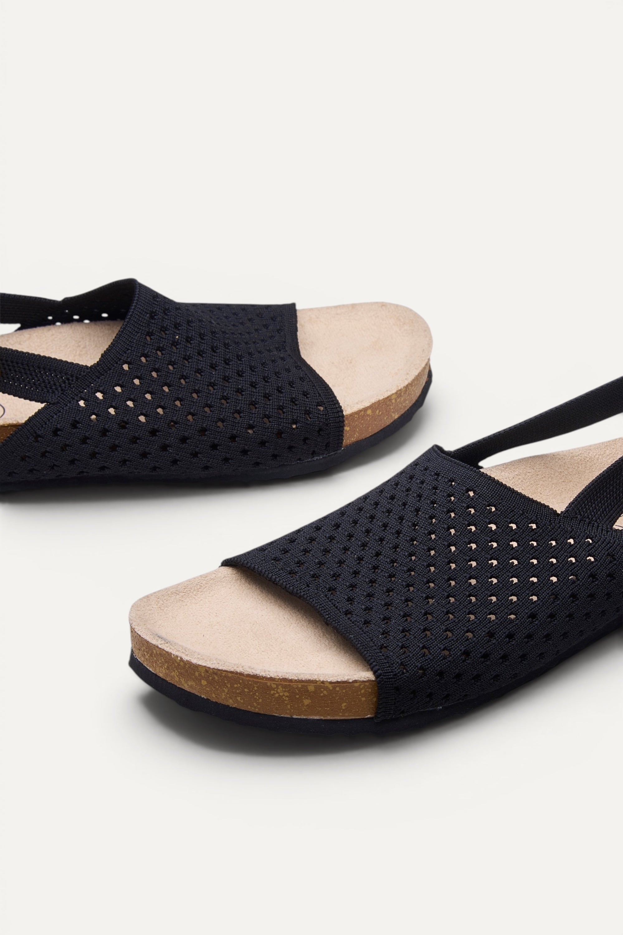 Top view of Rioz Mira Sandals (black), lightweight knit sandals made in India from rPET, 320g.