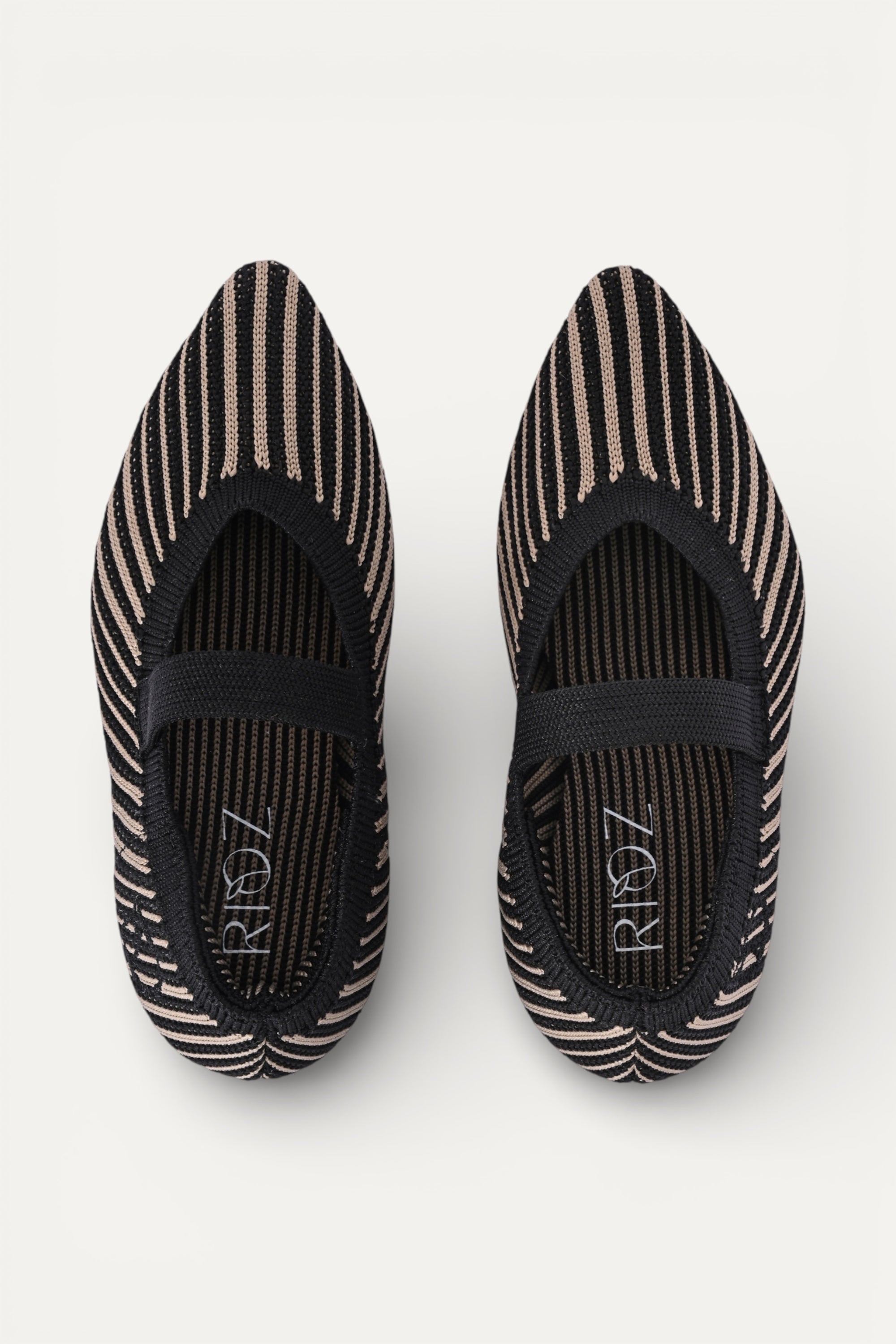Kids cream knit Mary Jane shoes with black strap, made using zero-waste 3D knitting from recycled PET (rPET) plastic bottles, lightweight breathable round-toe flats for everyday wear.