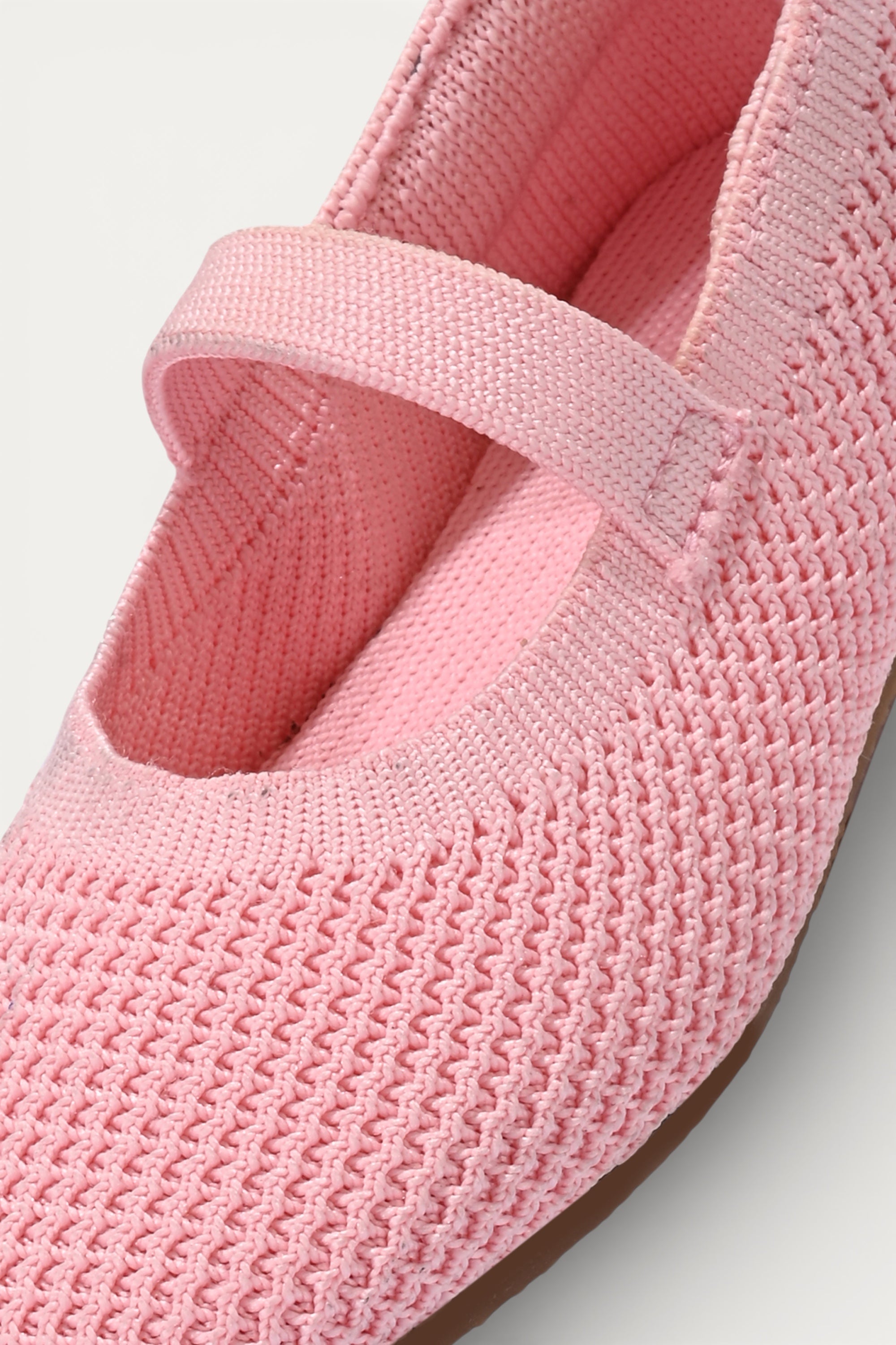 Kids Baby Pink knit Mary Jane shoes with black strap, made using zero-waste 3D knitting from recycled PET (rPET) plastic bottles, lightweight breathable round-toe flats for everyday wear.