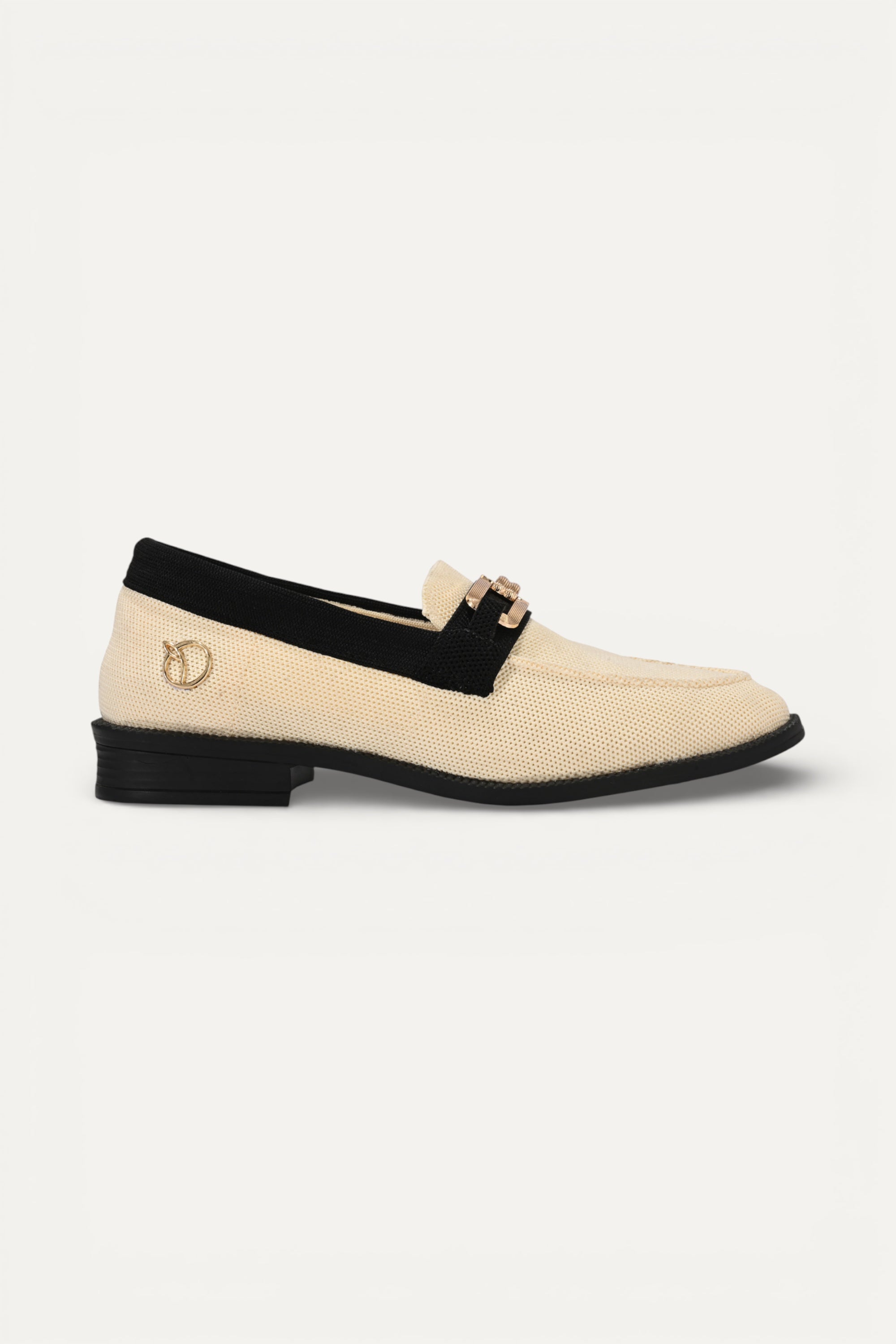 Rioz cream knit slip-on loafers with black trim and gold buckle detail, eco-friendly fabric and cushioned sole casual shoes