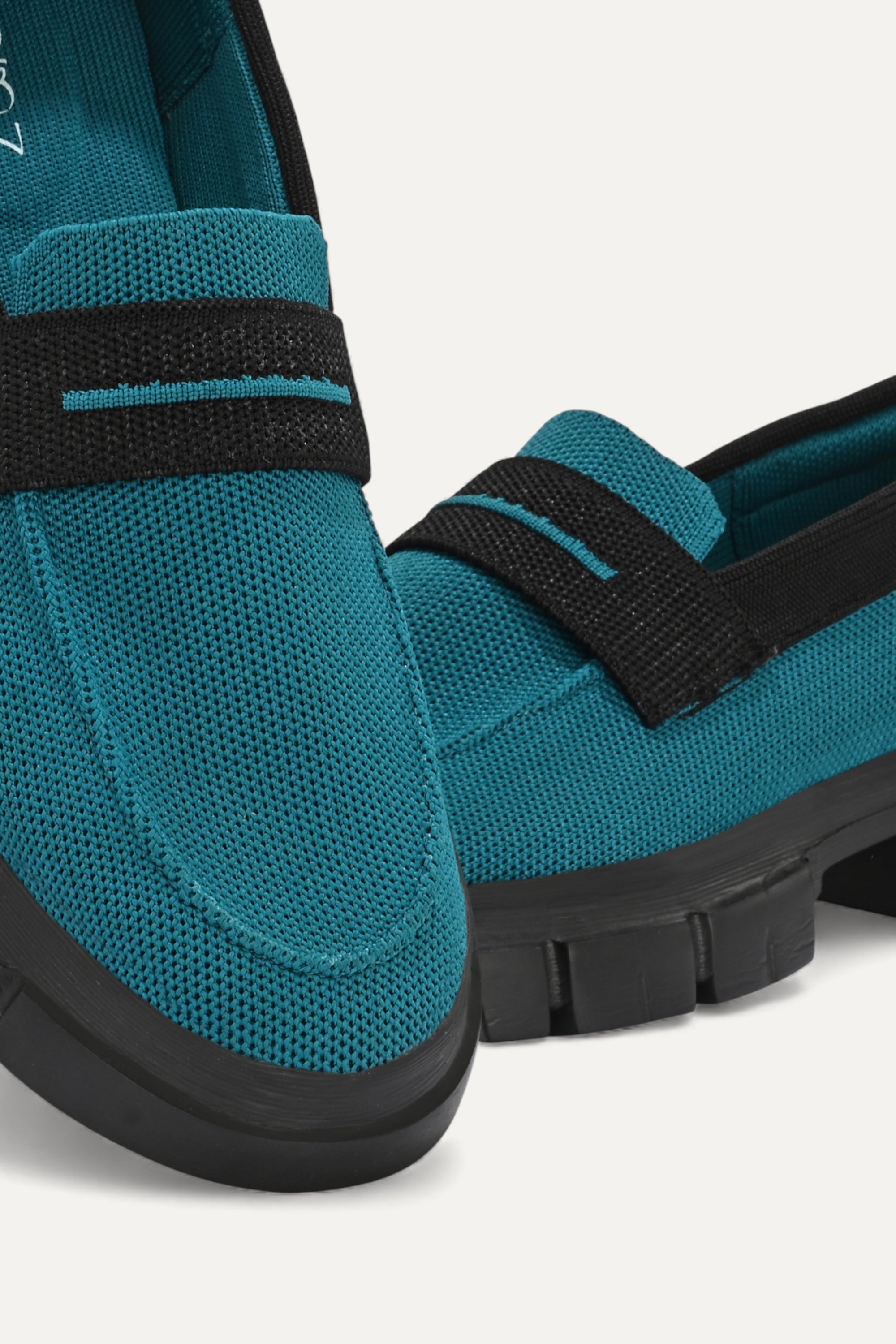 Rioz blue and black slip-on loafers for women with eco-friendly breathable knit fabric and cushioned sole