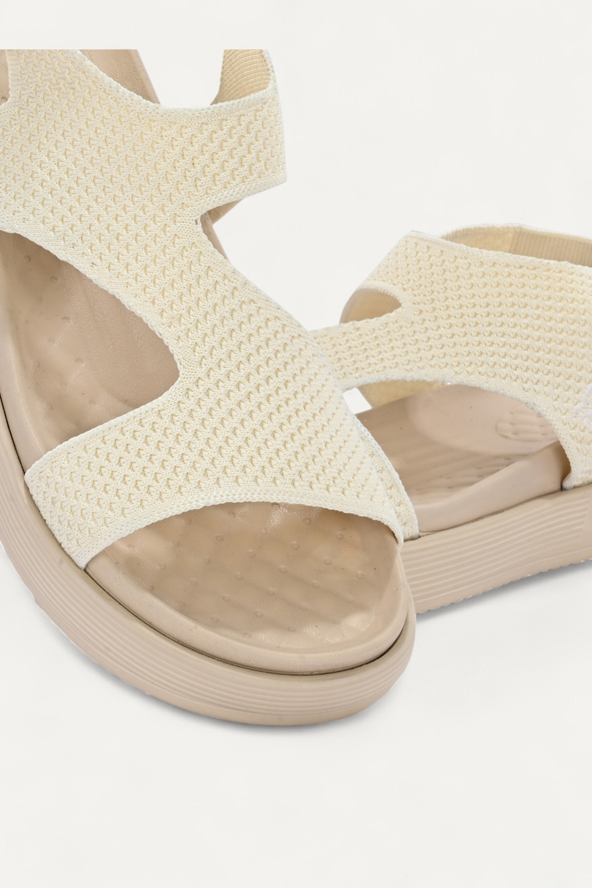 Rioz cream casual sandals for women with breathable knit straps and cushioned sole eco-friendly fabric and cushioned sole