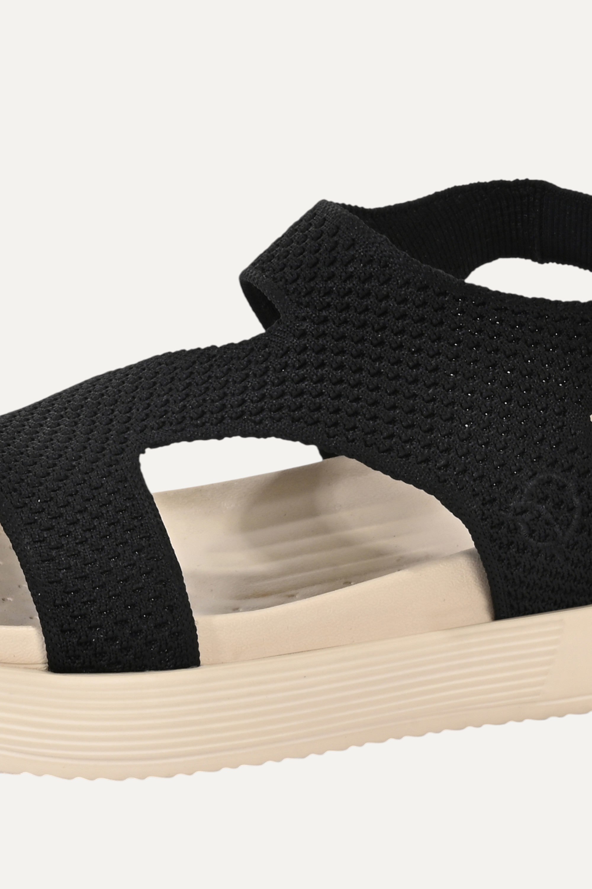 Rioz black casual sandals for women with breathable knit straps and cushioned sole eco-friendly fabric and cushioned sole