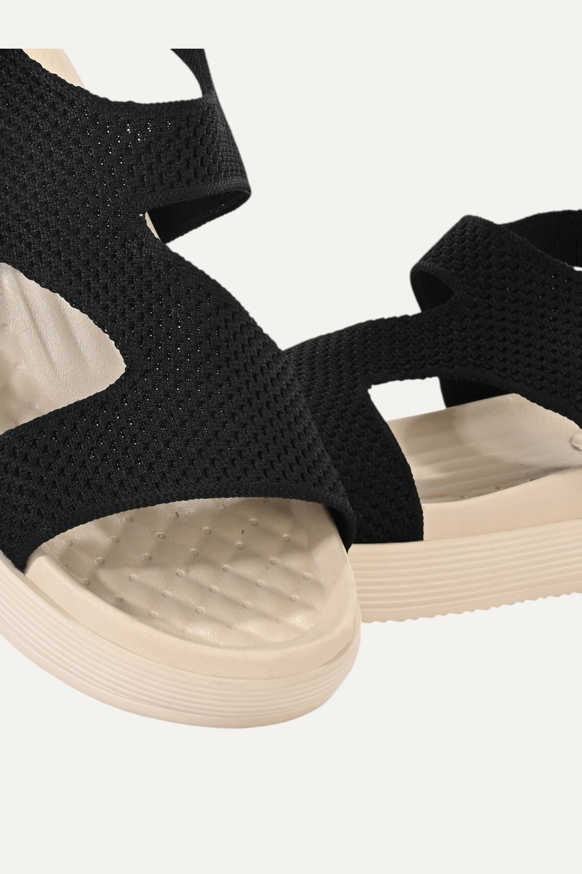 Rioz black casual sandals for women with breathable knit straps and cushioned sole eco-friendly fabric and cushioned sole
