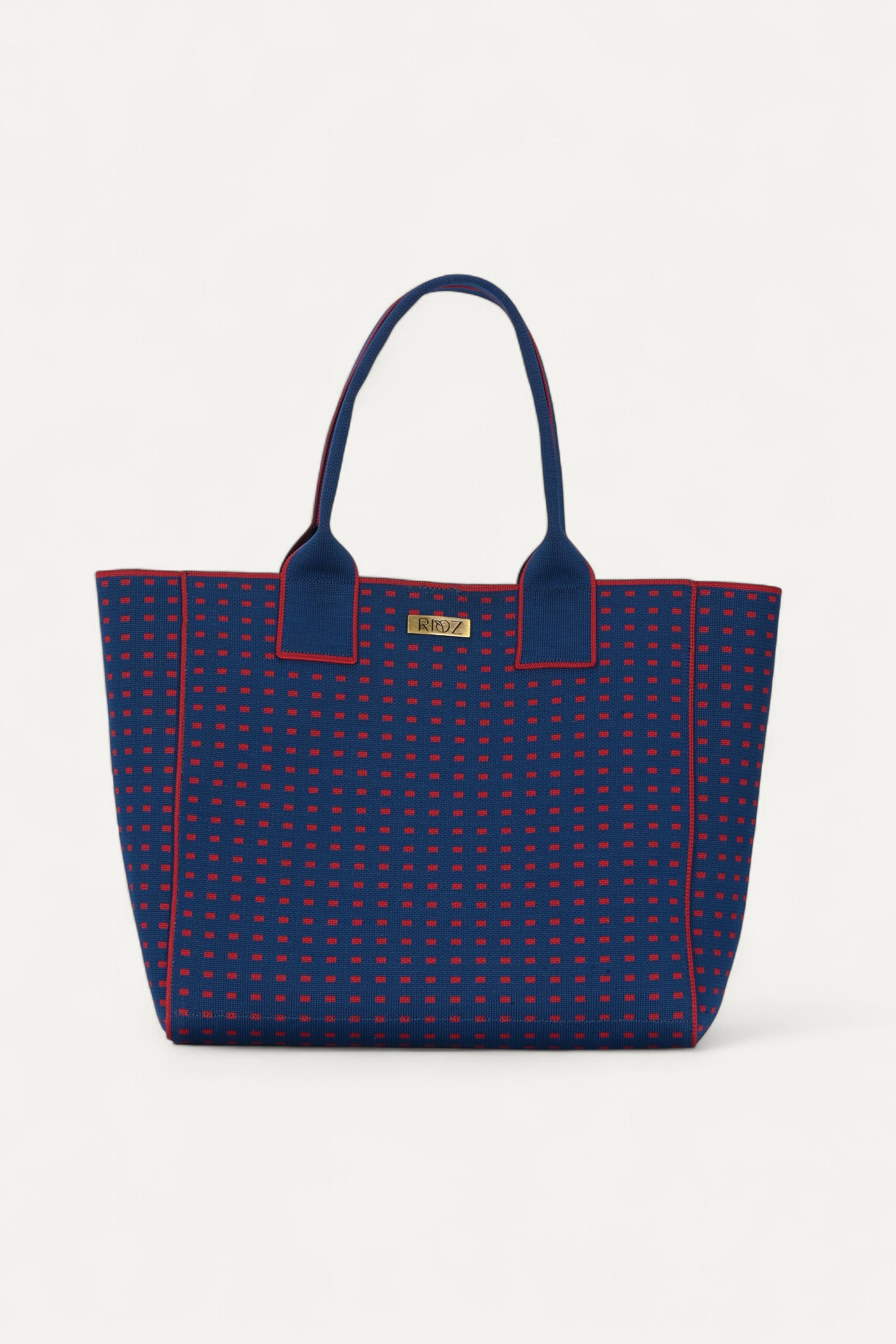 Eco-friendly backpack by Rioz blue and red crossbody bag, stylish textured handbag for women
