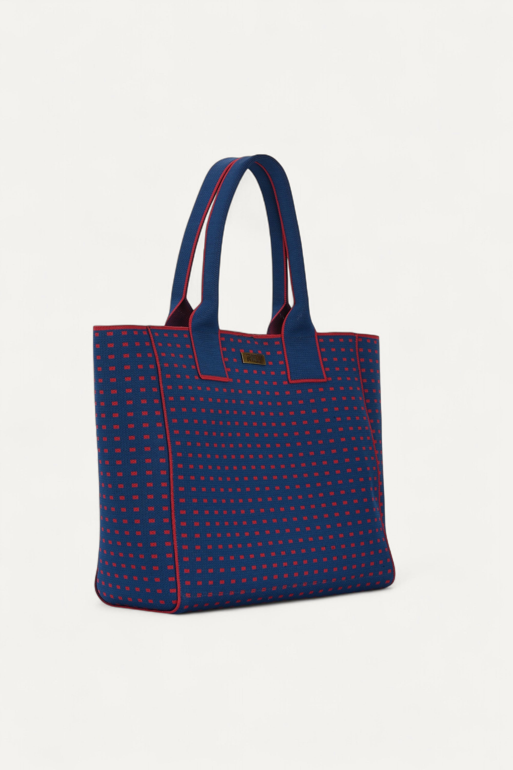 Eco-friendly backpack by Rioz blue and red crossbody bag, stylish textured handbag for women