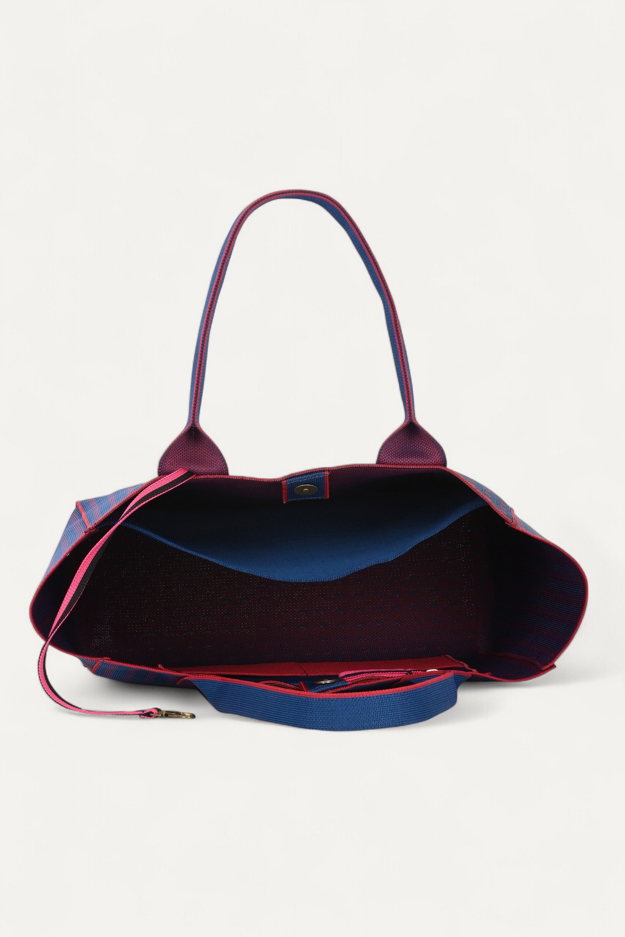 Eco-friendly backpack by Rioz blue and red crossbody bag, stylish textured handbag for women