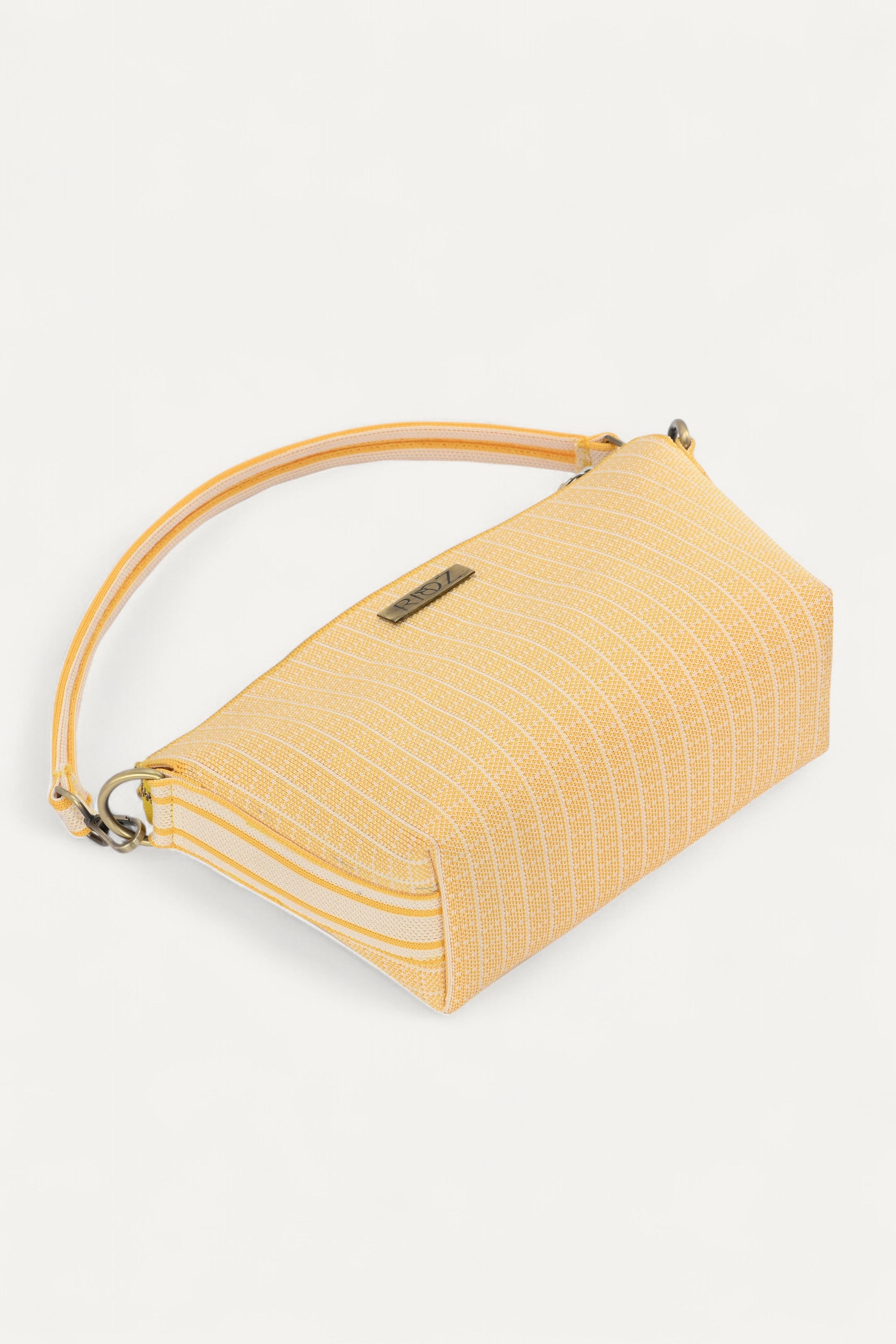Rioz-Eco friendly bags-crossbody bags for women- sustainable-made from recycled plastic- secure zipper