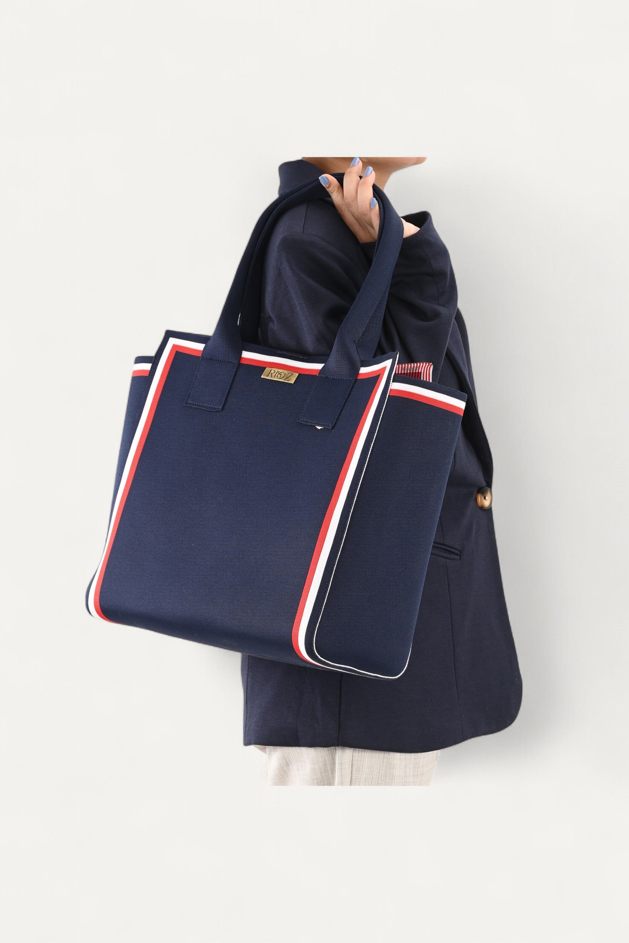 Eco-friendly backpack by Rioz — lightweight, machine-washable and spacious, made from recycled PET bottles for sustainable everyday use.