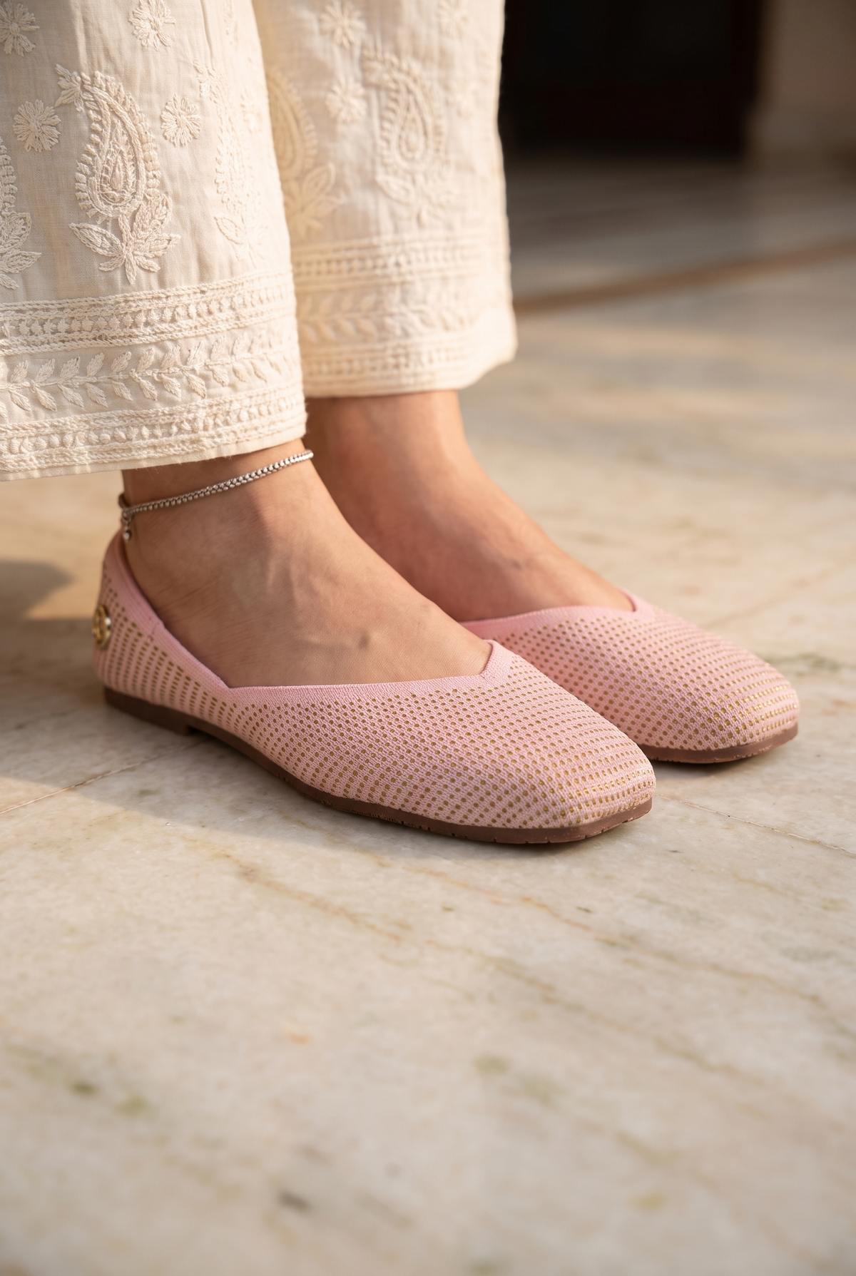 Sitara Juttis Pink Gold foot closeup on Indian woman in traditional sharara