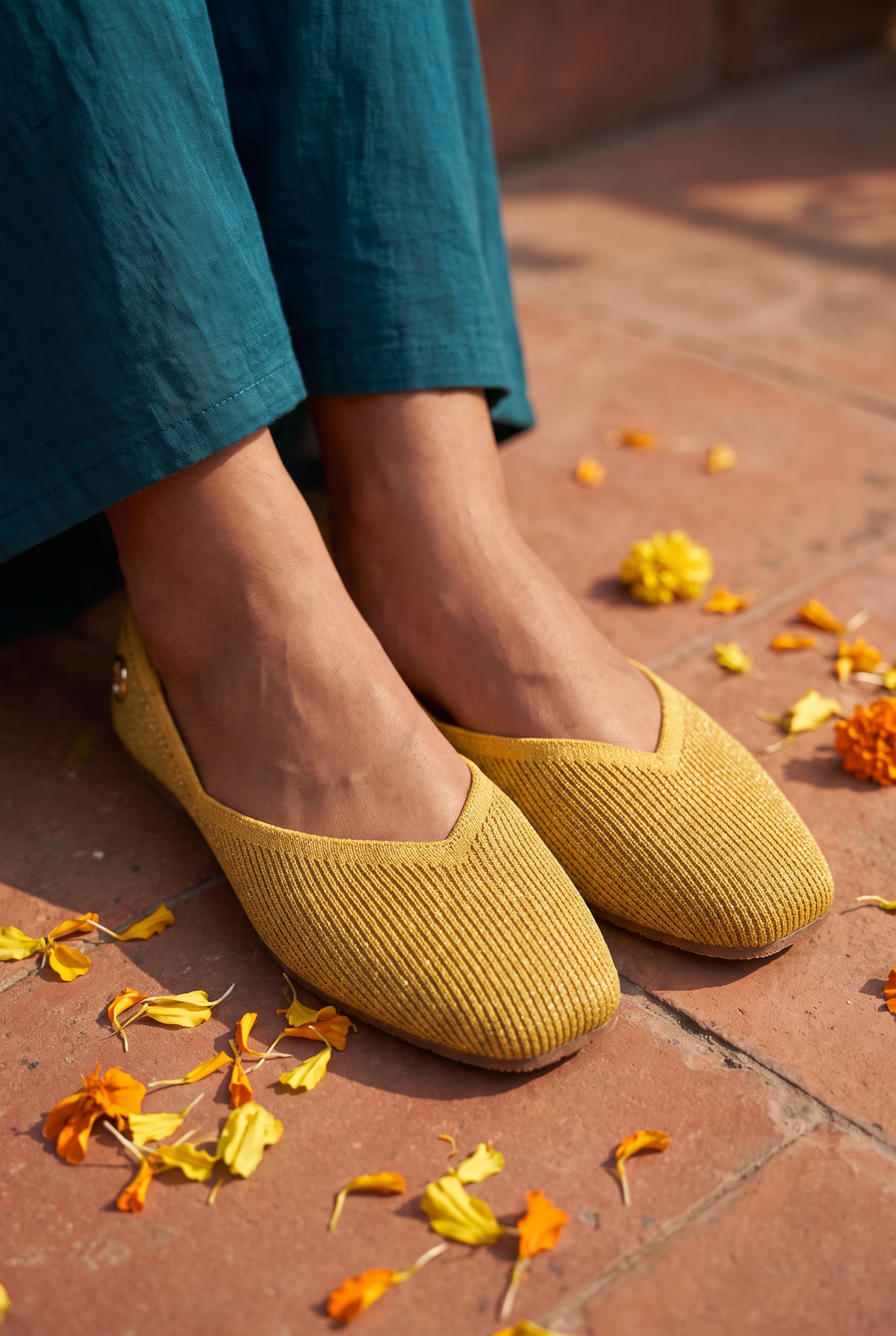 Sitara Juttis Mustard Gold foot closeup on Indian woman in traditional sharara