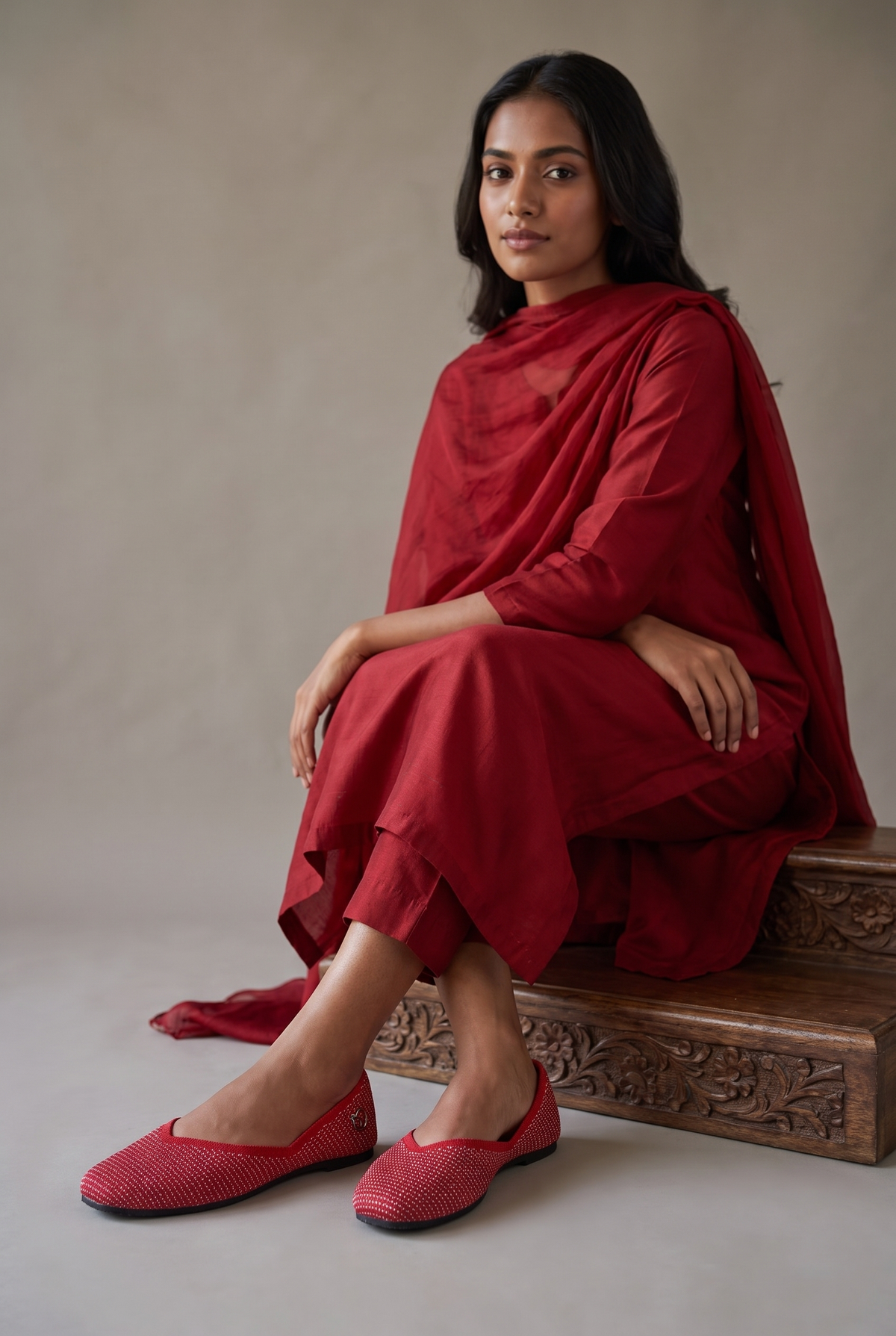 Rioz Sitara red silver shimmer jutti worn with a tonal red kurta set