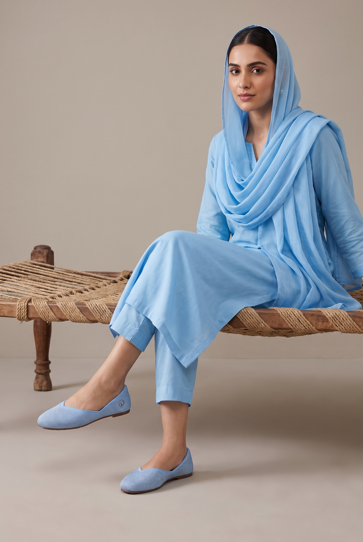 Rioz Lehar sky blue silver shimmer jutti worn with a tonal sky blue kurta set