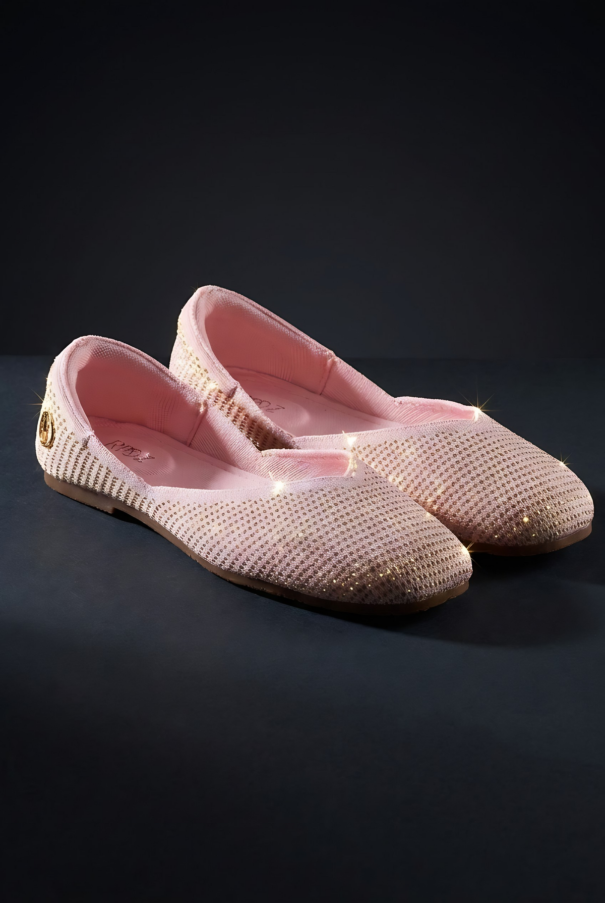 Sitara Juttis Pink Gold shimmer and shape, sparkling jutti pair