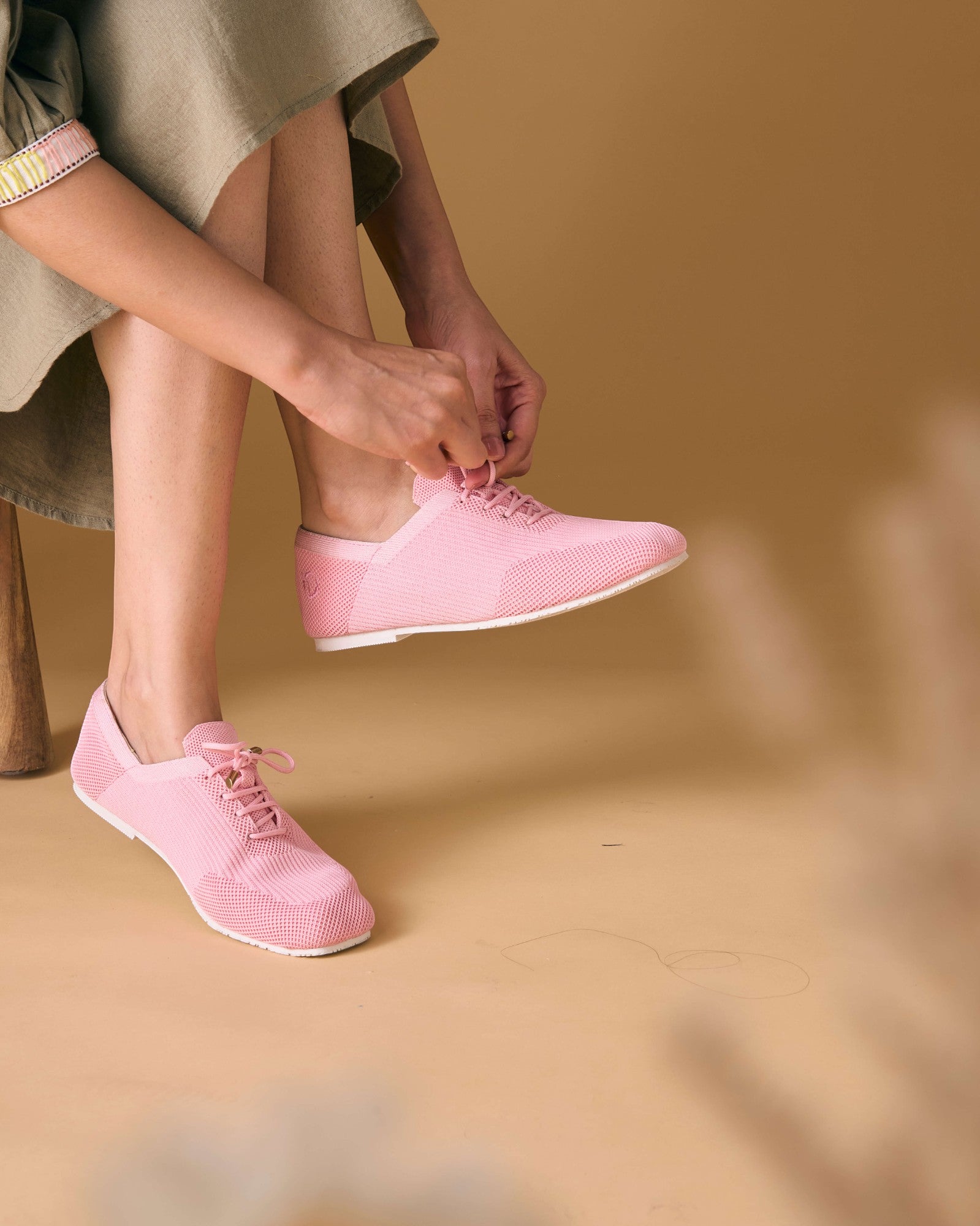 Rioz pink knit sneakers for women with breathable mesh design, lace-up closure, and white sole