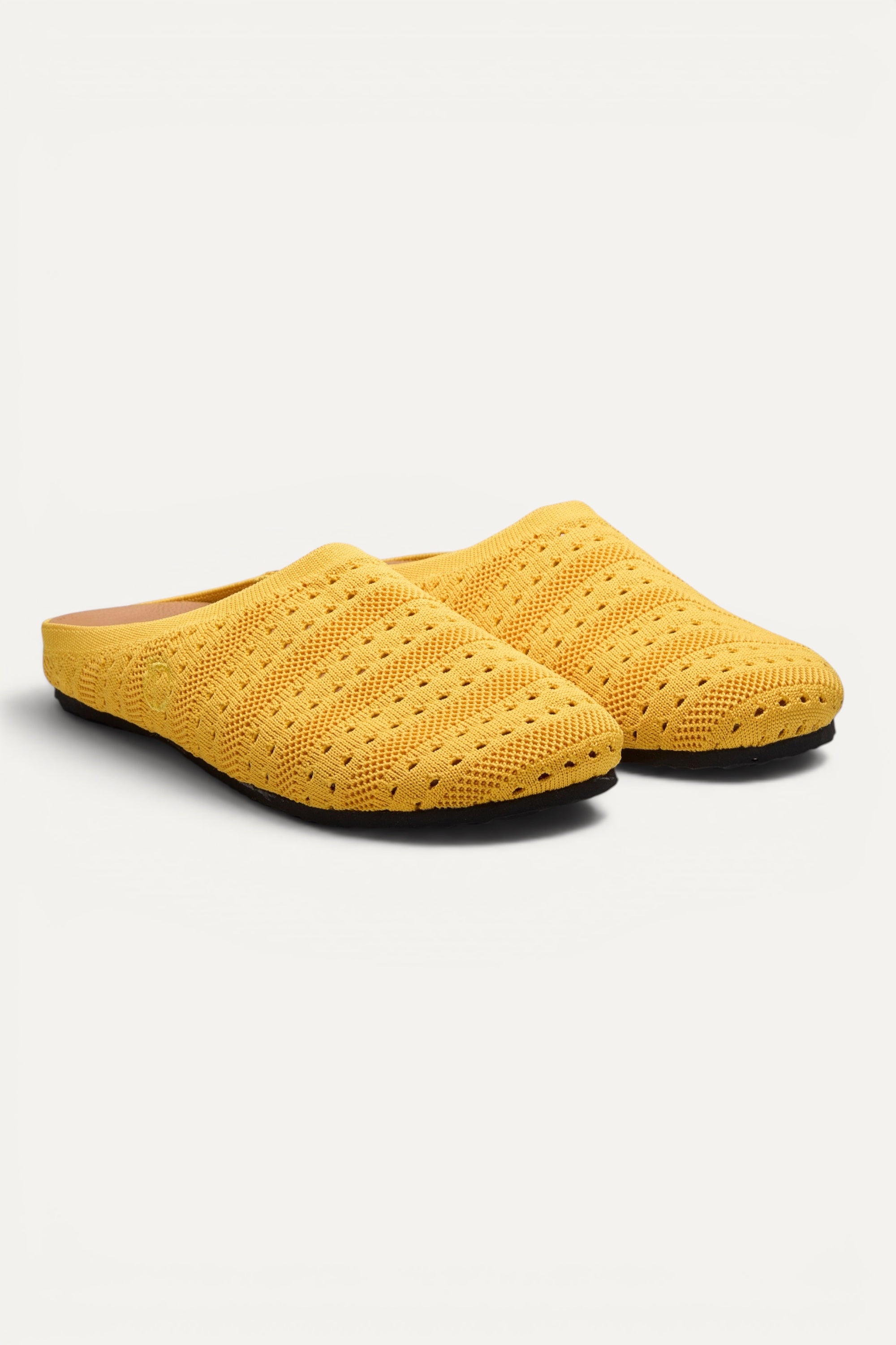 Yellow Rioz Lumi Mules — vegan slip-on knit clogs for summer and statement looks, machine washable.
