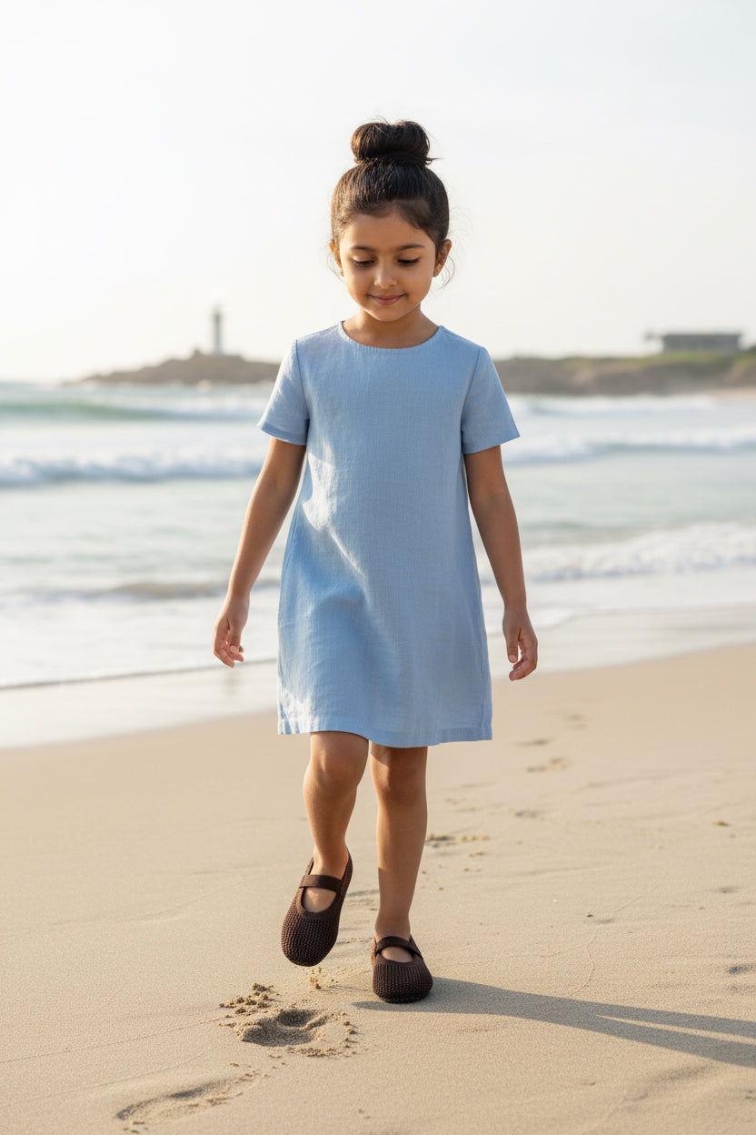 Kids Brown knit Mary Jane shoes with black strap, made using zero-waste 3D knitting from recycled PET (rPET) plastic bottles, lightweight breathable round-toe flats for everyday wear.