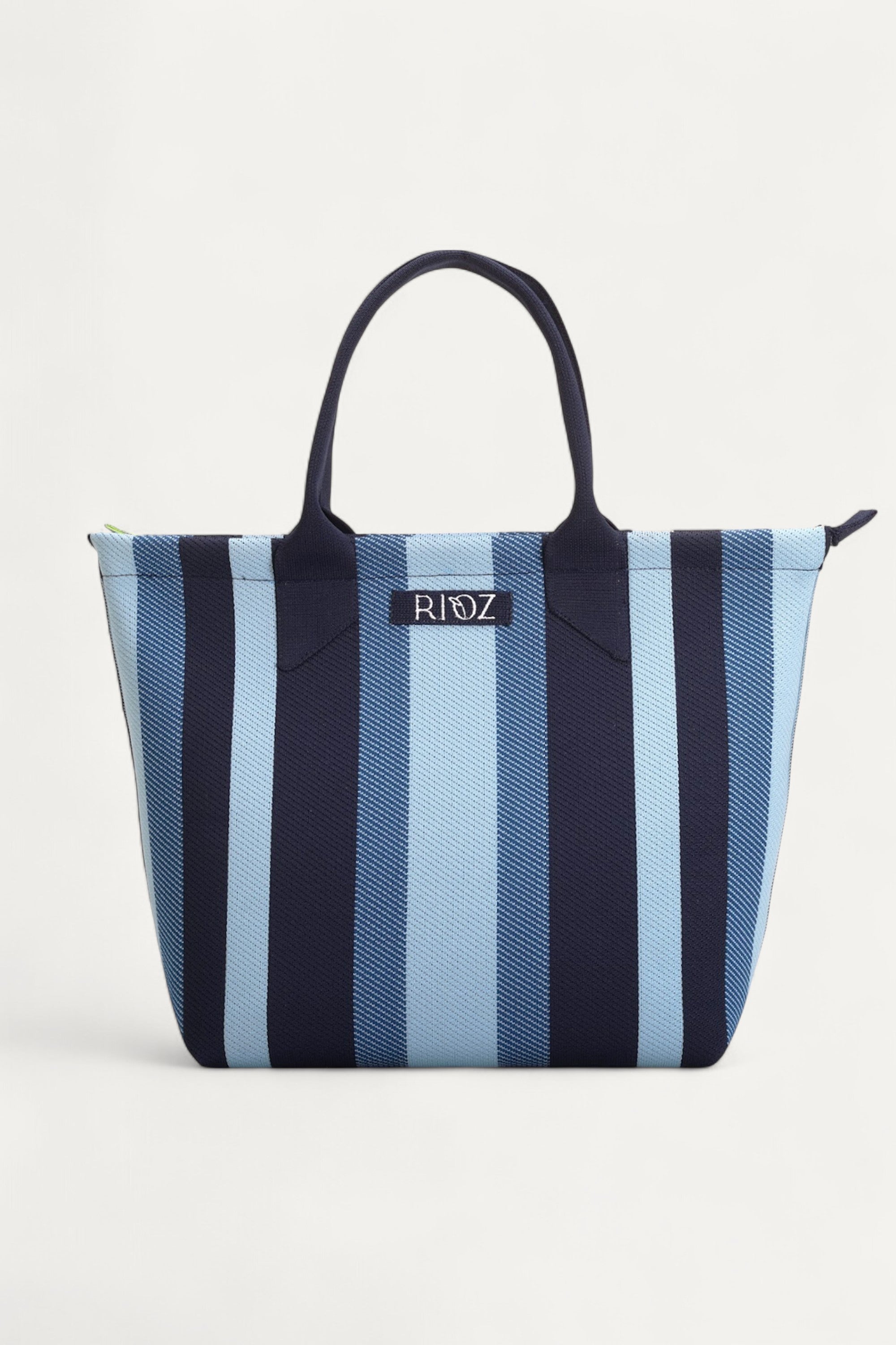 rioz-Eco-friendly zipper tote bag for women—sustainable, spacious, and made from recycled materials, ideal for everyday use and conscious living.