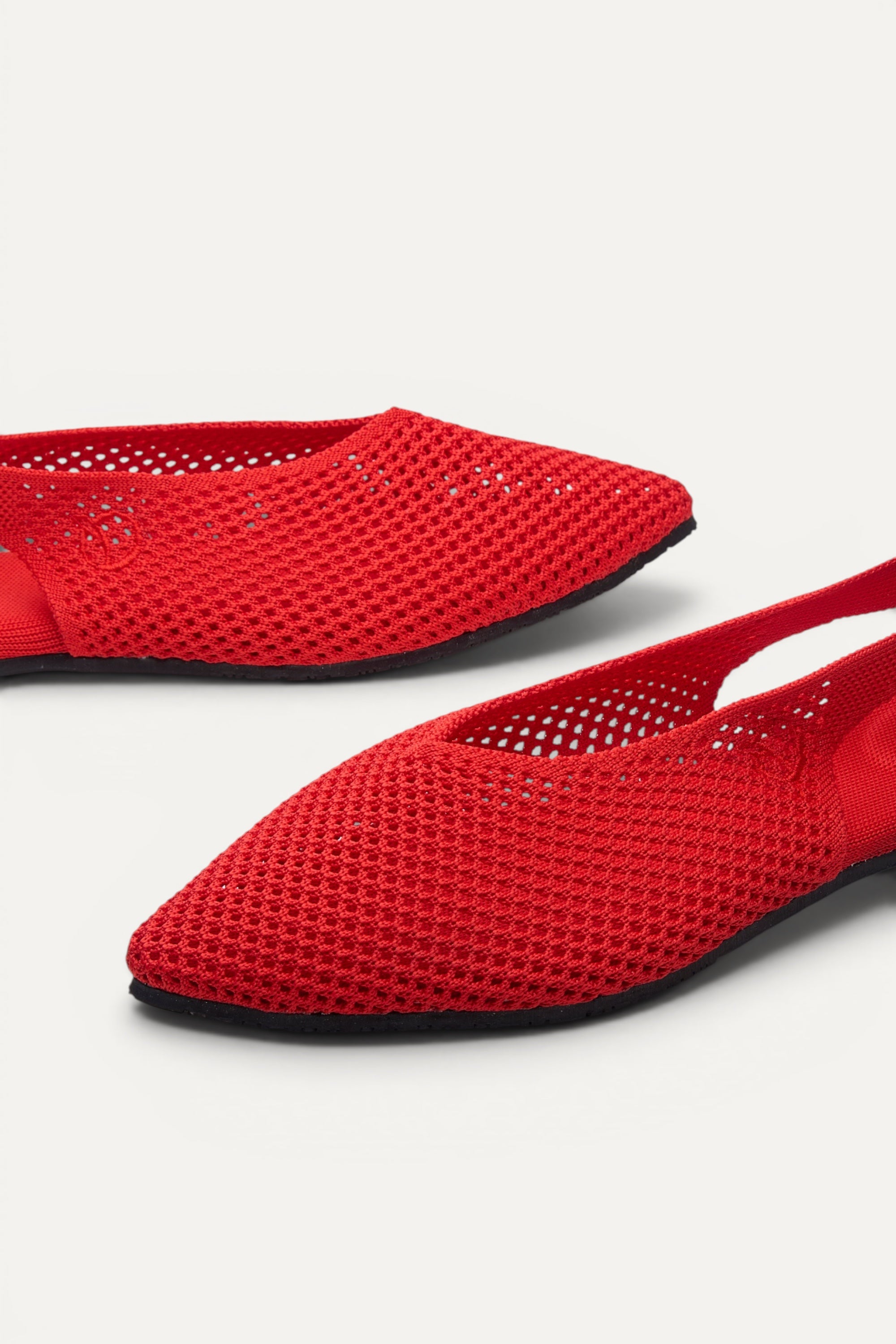 Top view of Rioz Airknit Slingbacks (red, pointed-toe), lightweight knit flats from rPET bottles.