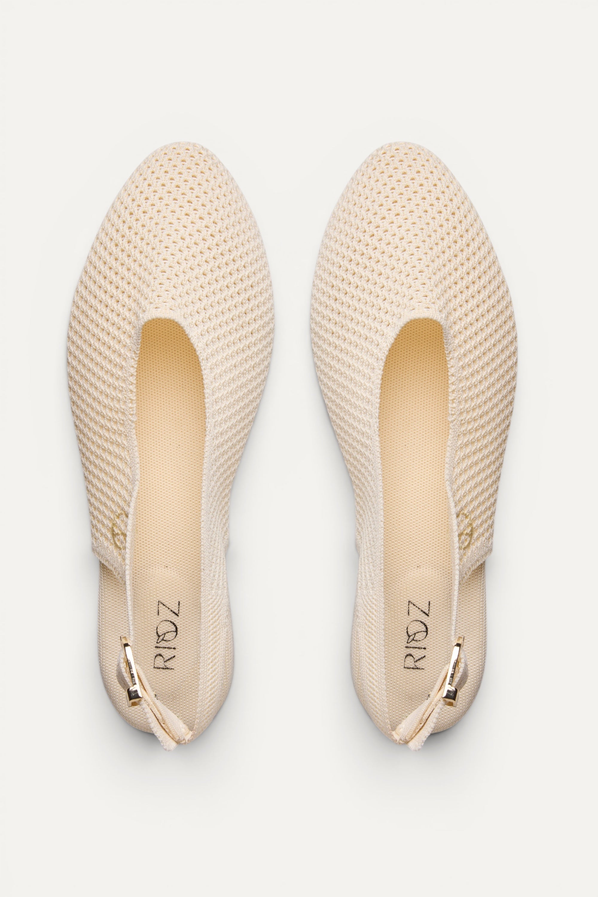 Rioz Airknit Slingbacks in ivory, vegan almond-toe knit flats from recycled PET bottles, made in India.