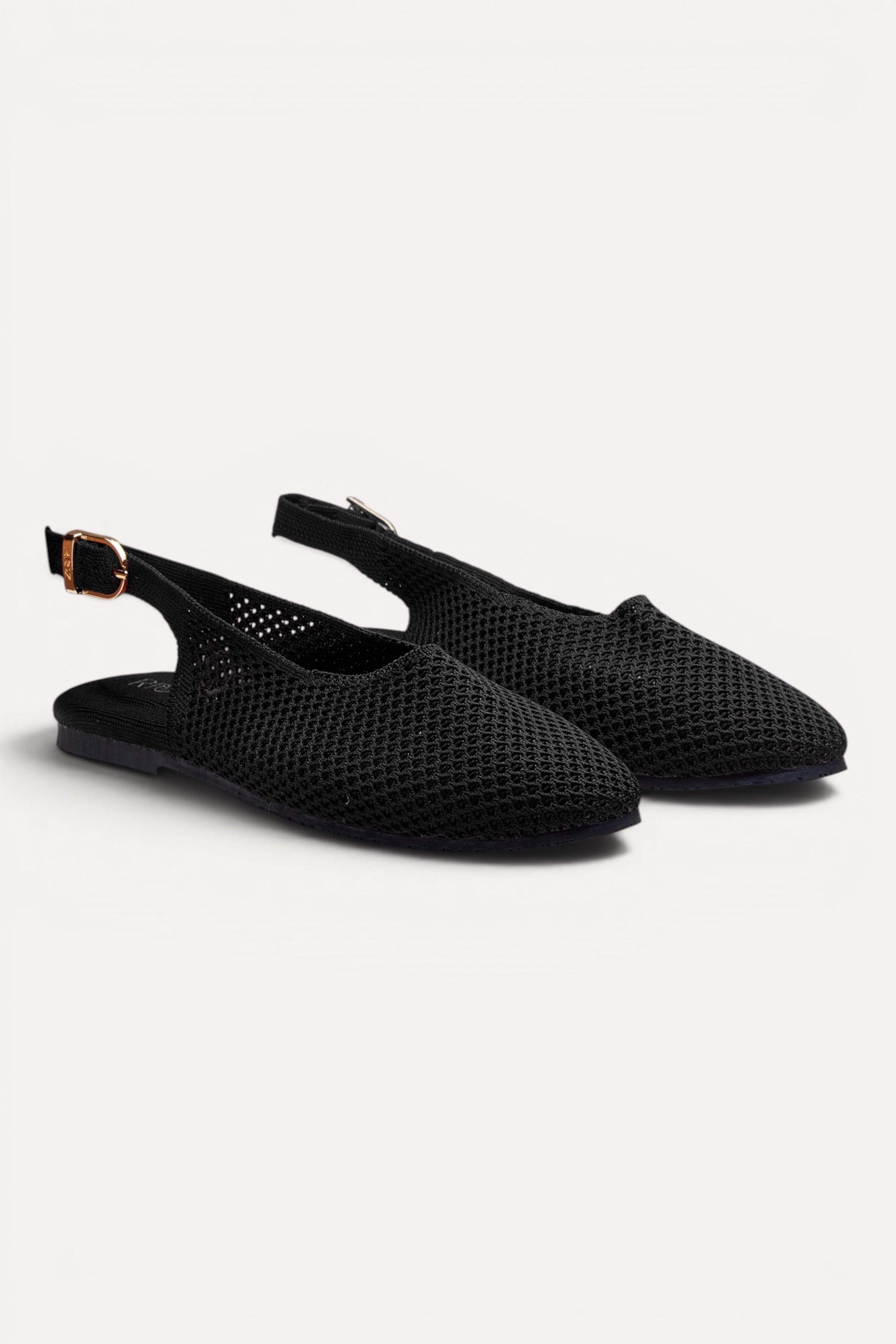 Rioz Airknit Slingbacks in black, vegan almond-toe knit flats from recycled PET bottles, made in India.