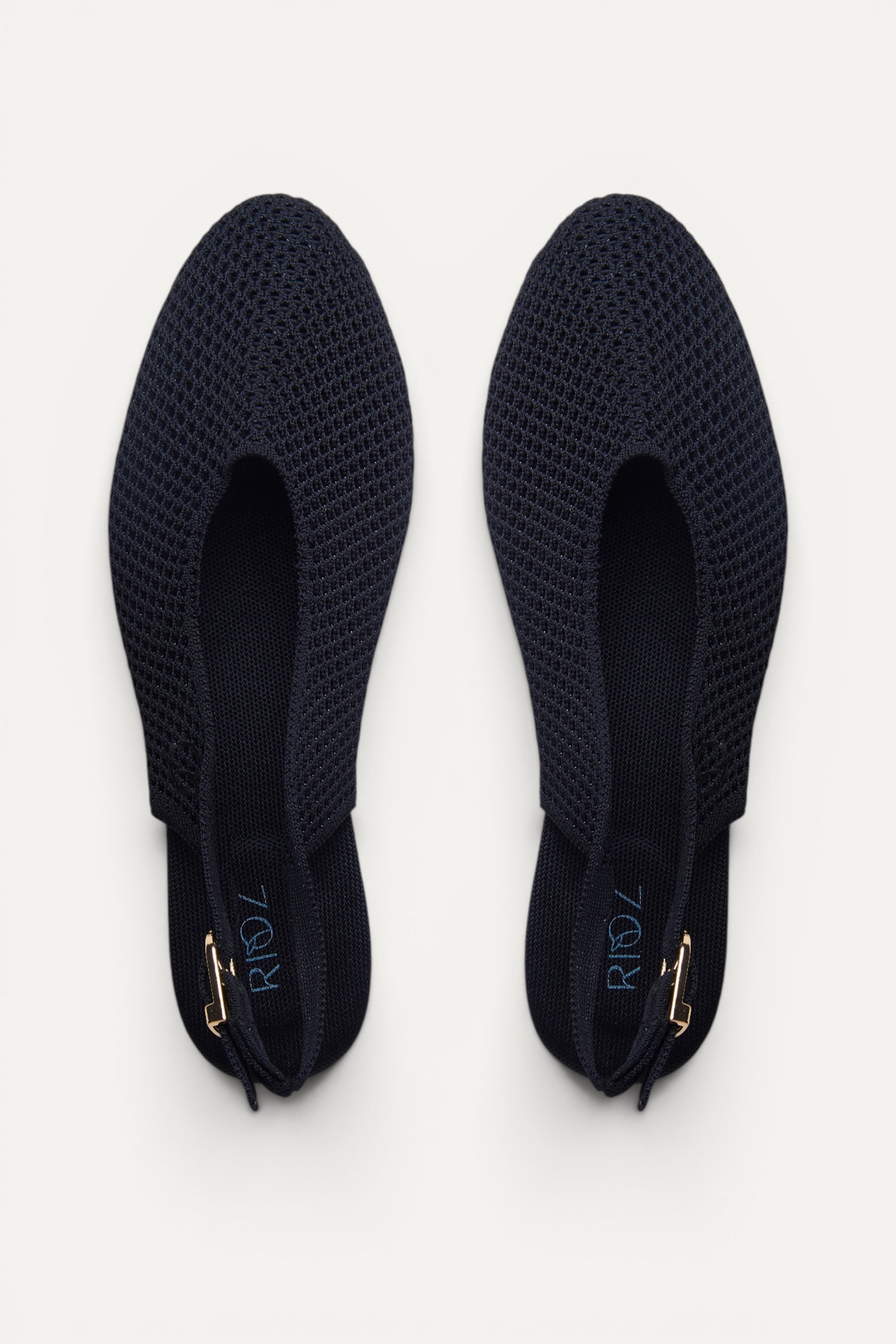 Rioz Airknit Slingbacks in black, vegan almond-toe knit flats from recycled PET bottles, made in India.
