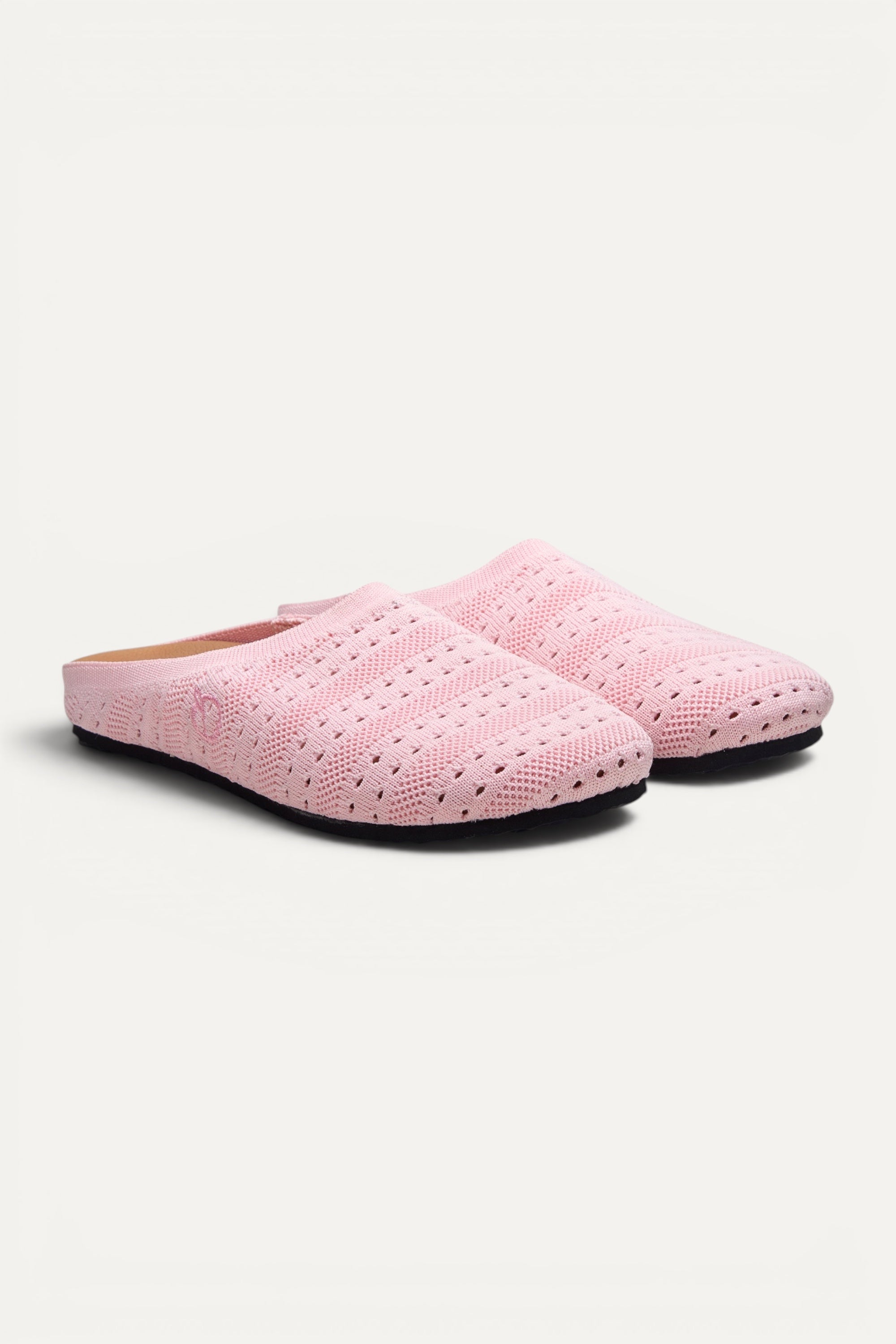 Rioz Lumi Mules in pink, vegan closed-toe knit clogs from 10 recycled PET bottles, made in India.
