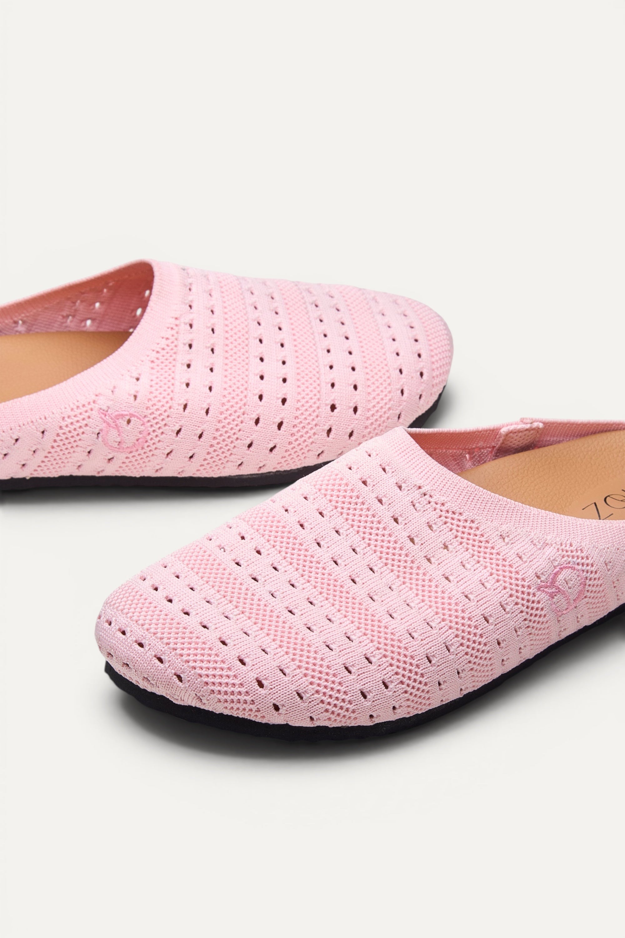 Top view of Rioz Lumi Mules (pink), lightweight 350g knit clogs made in India from rPET.
