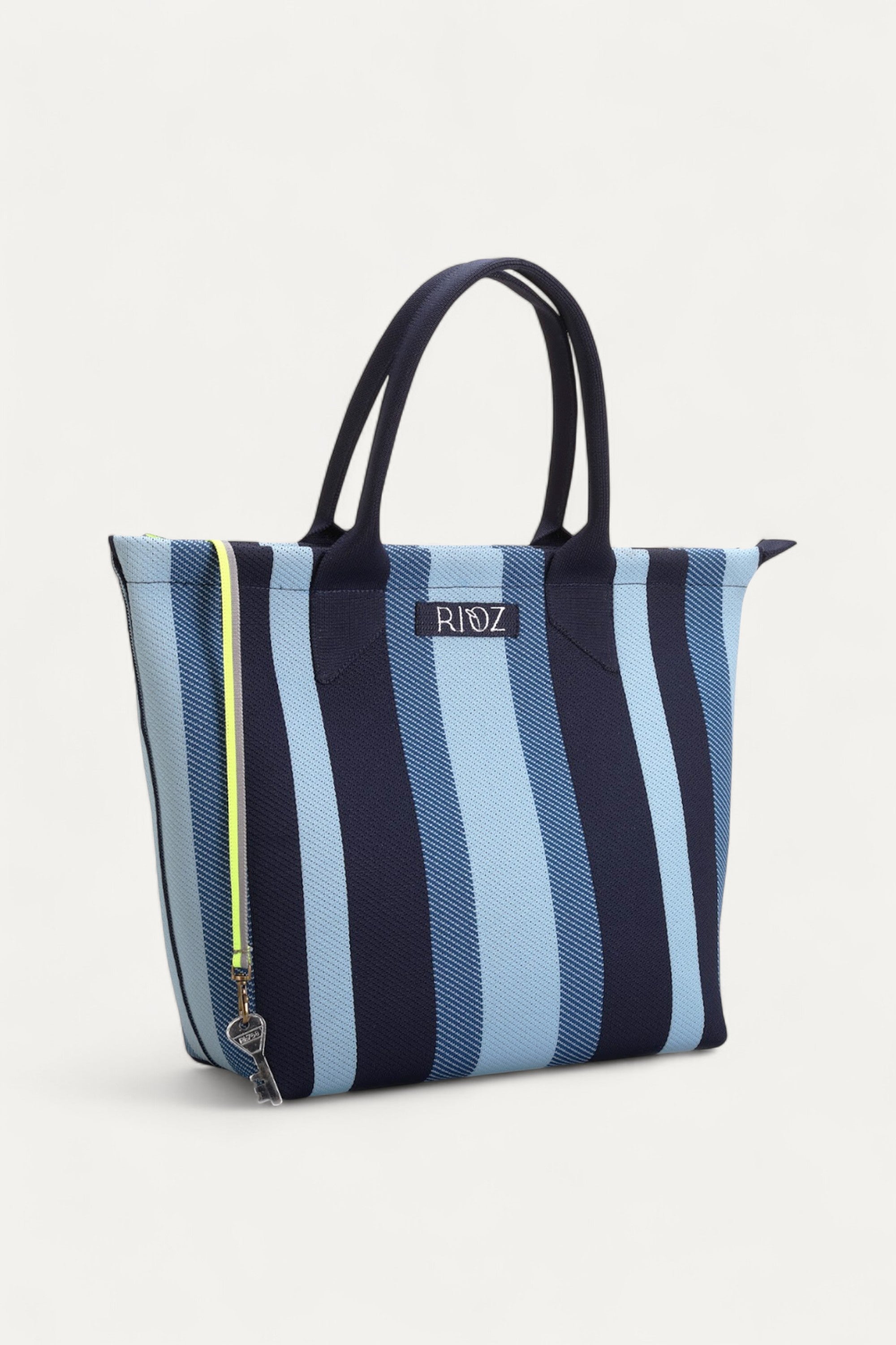rioz-Eco-friendly zipper tote bag for women—sustainable, spacious, and made from recycled materials, ideal for everyday use and conscious living.