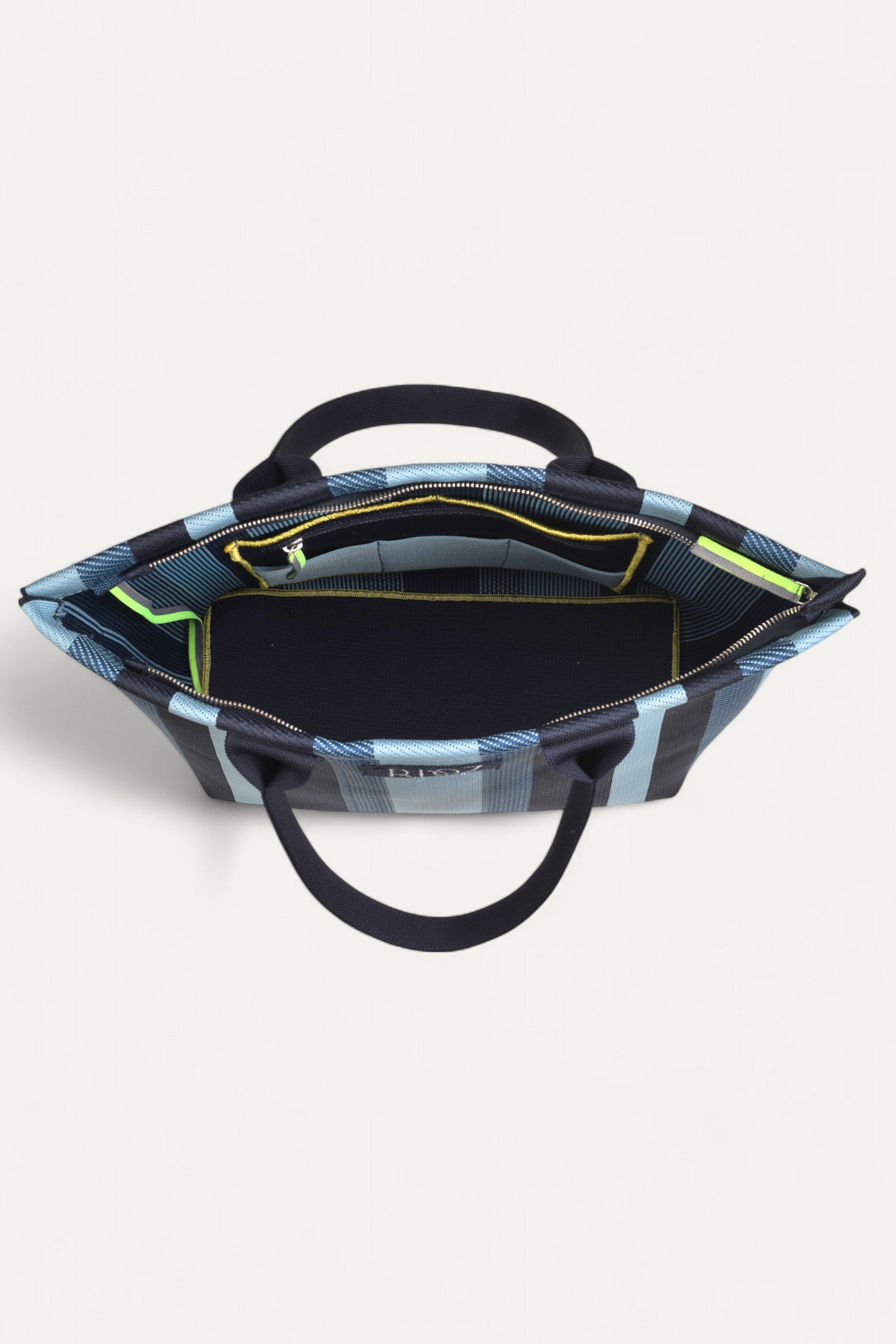 rioz-Eco-friendly zipper tote bag for women—sustainable, spacious, and made from recycled materials, ideal for everyday use and conscious living.