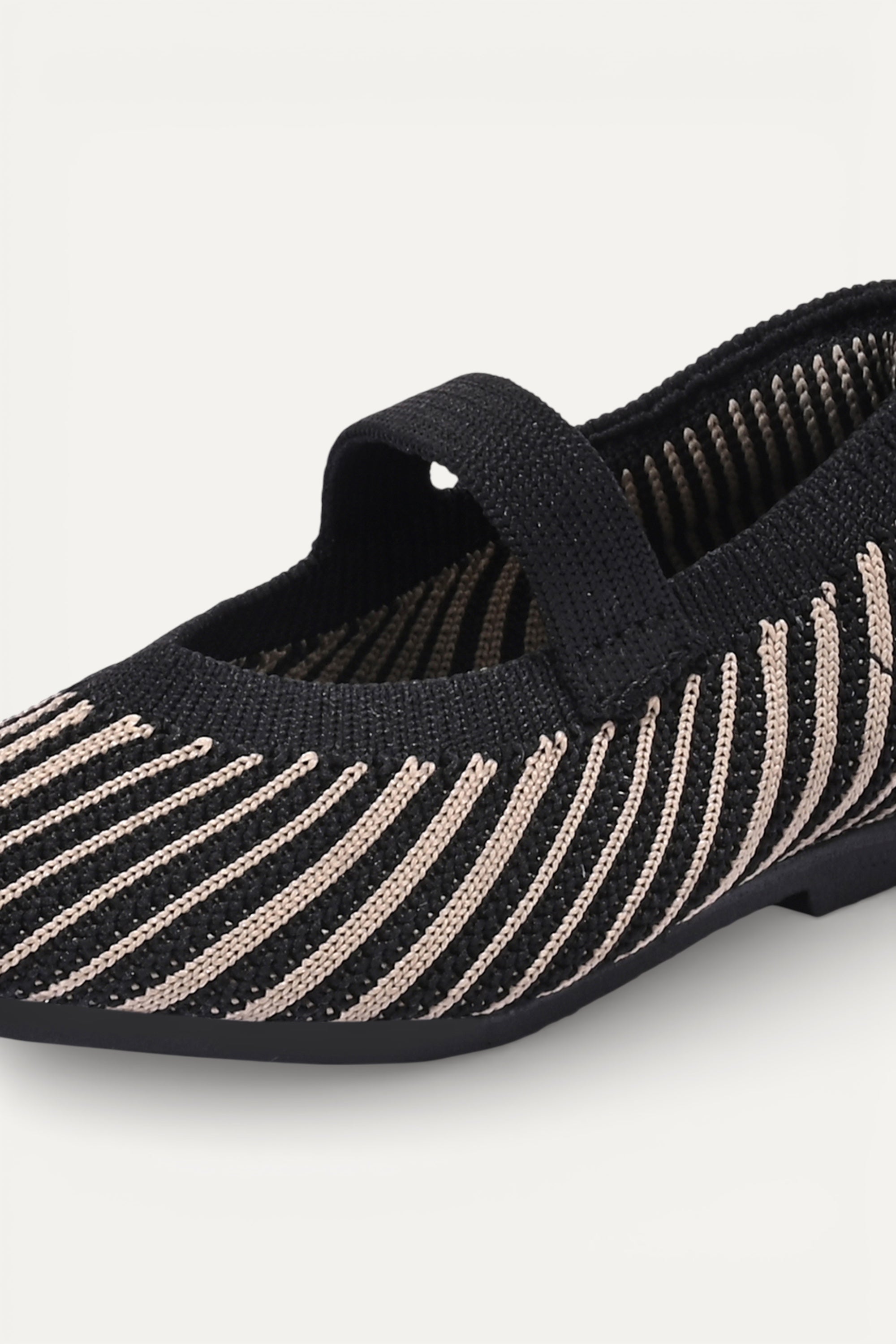 Kids cream knit Mary Jane shoes with black strap, made using zero-waste 3D knitting from recycled PET (rPET) plastic bottles, lightweight breathable round-toe flats for everyday wear.