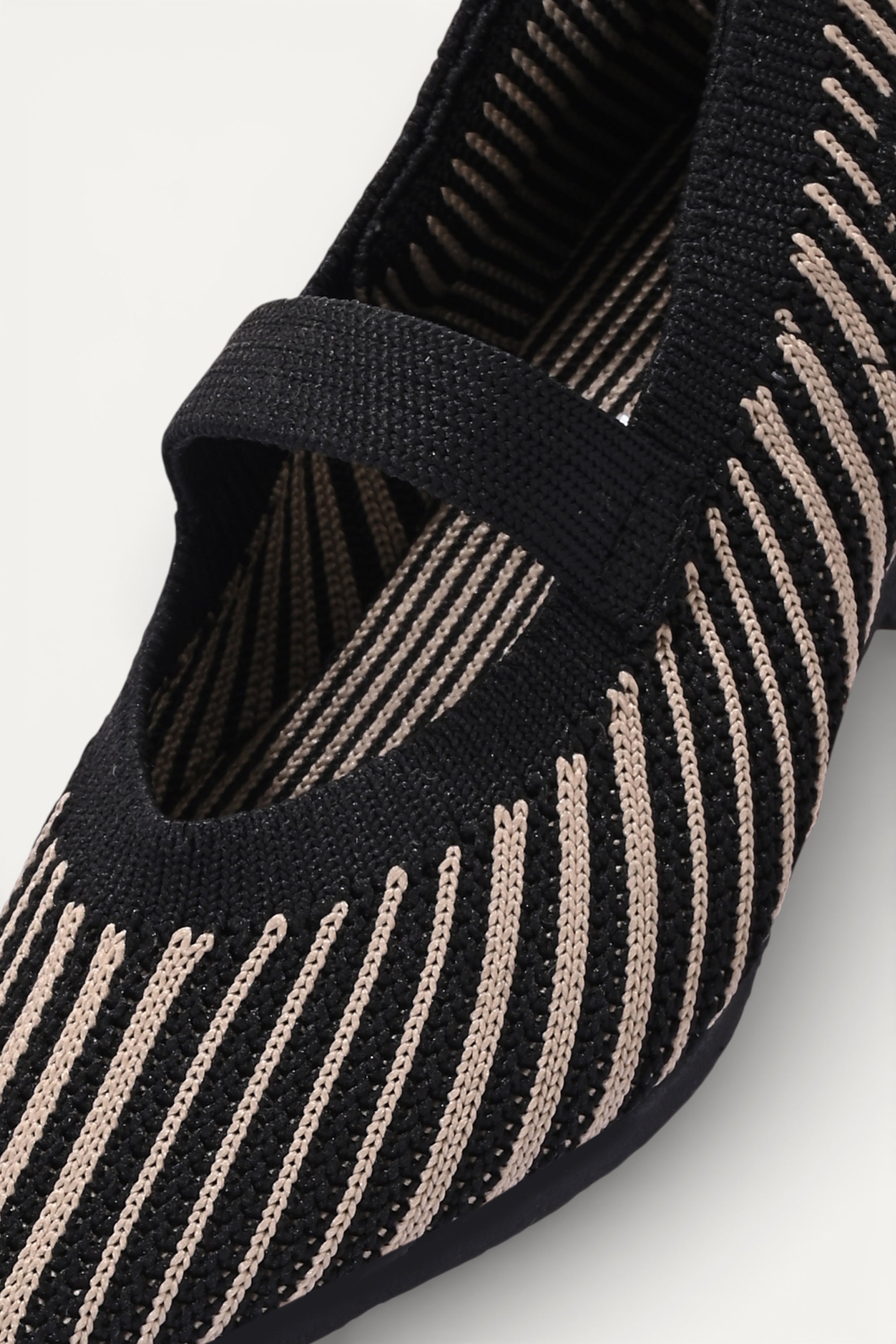 Kids cream knit Mary Jane shoes with black strap, made using zero-waste 3D knitting from recycled PET (rPET) plastic bottles, lightweight breathable round-toe flats for everyday wear.