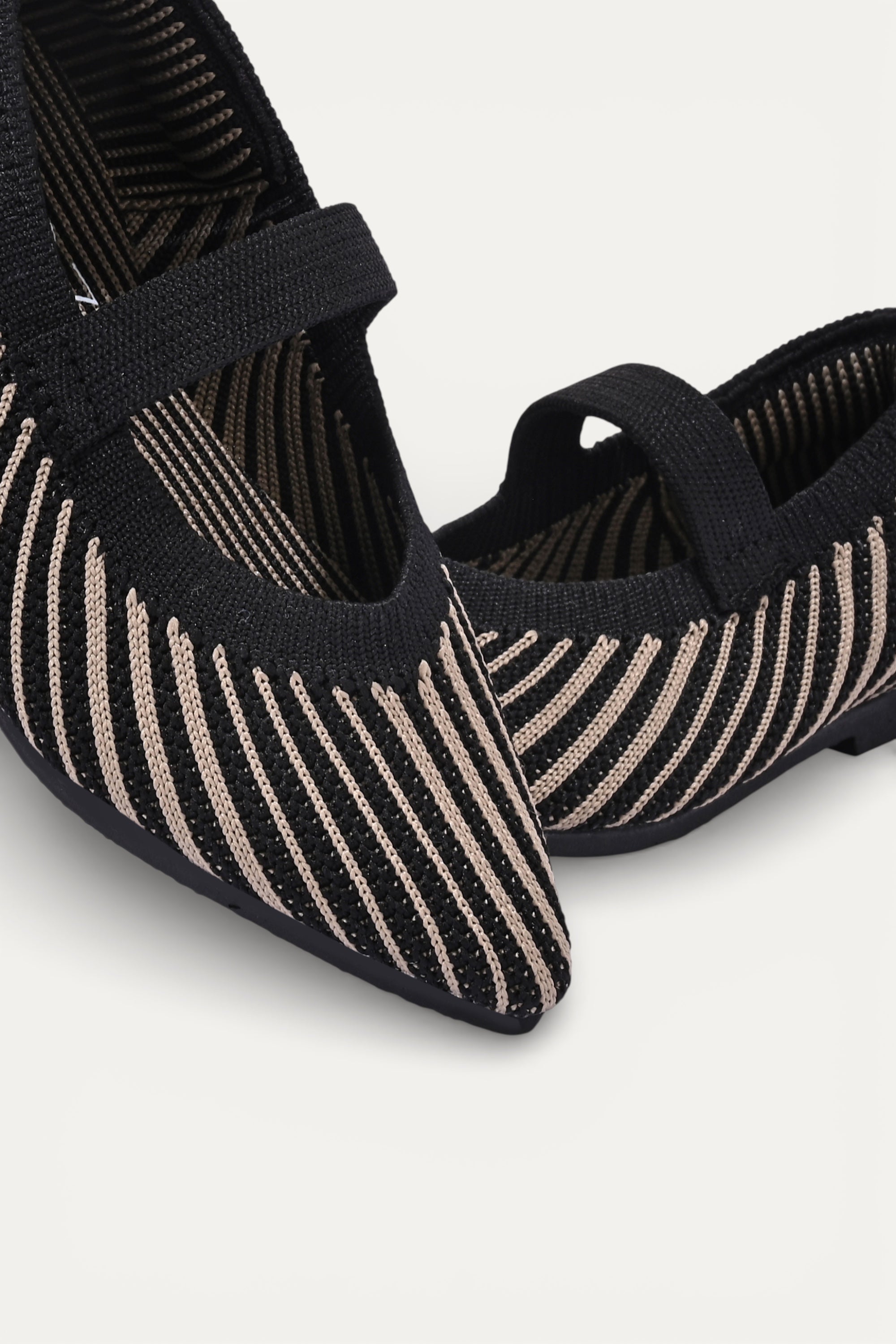 Kids cream knit Mary Jane shoes with black strap, made using zero-waste 3D knitting from recycled PET (rPET) plastic bottles, lightweight breathable round-toe flats for everyday wear.