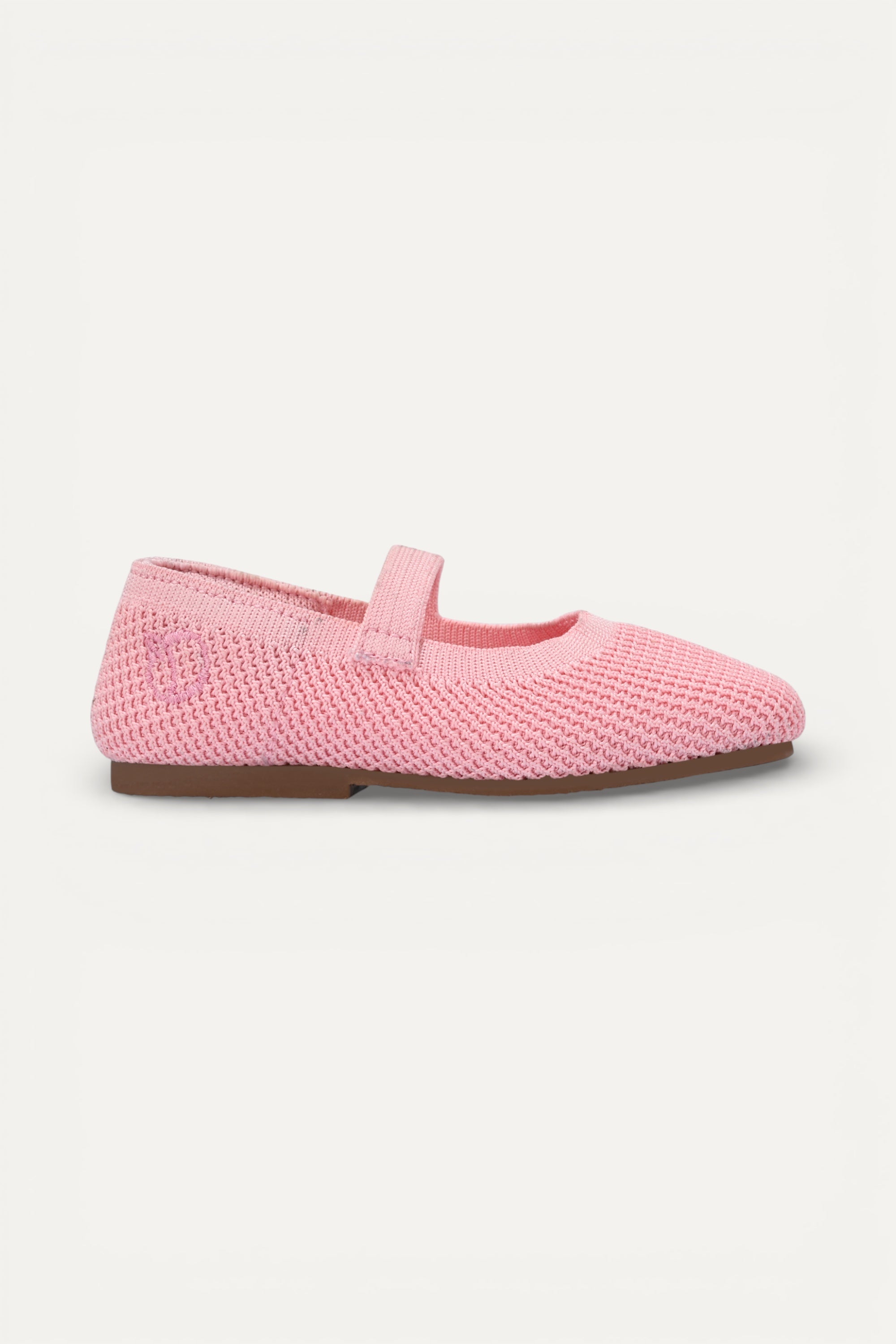 Kids Baby Pink knit Mary Jane shoes with black strap, made using zero-waste 3D knitting from recycled PET (rPET) plastic bottles, lightweight breathable round-toe flats for everyday wear.