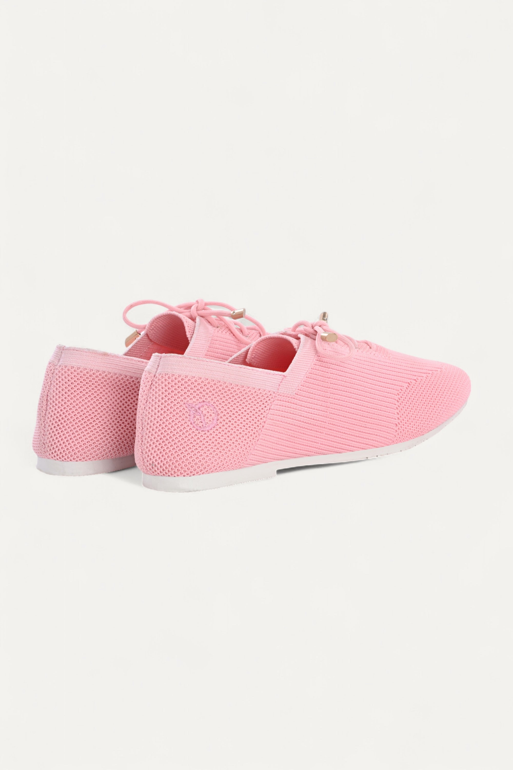 Rioz pink knit sneakers for women with breathable mesh design, lace-up closure, and white sole
