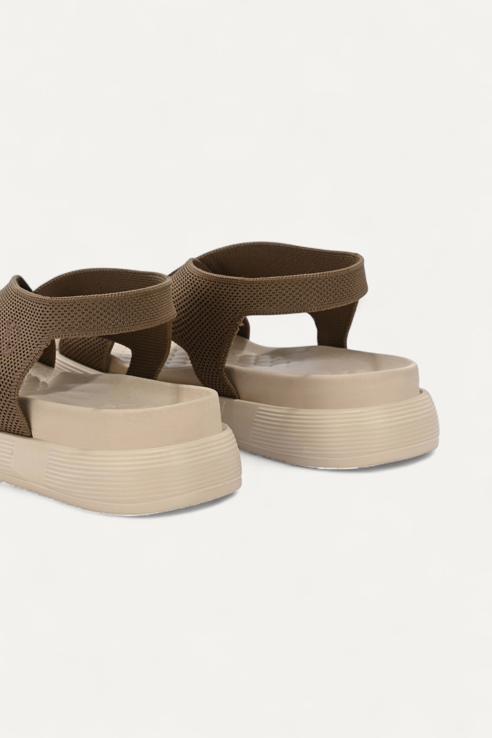 Rioz brown casual sandals for women with breathable knit straps and cushioned sole eco-friendly fabric and cushioned sole 
