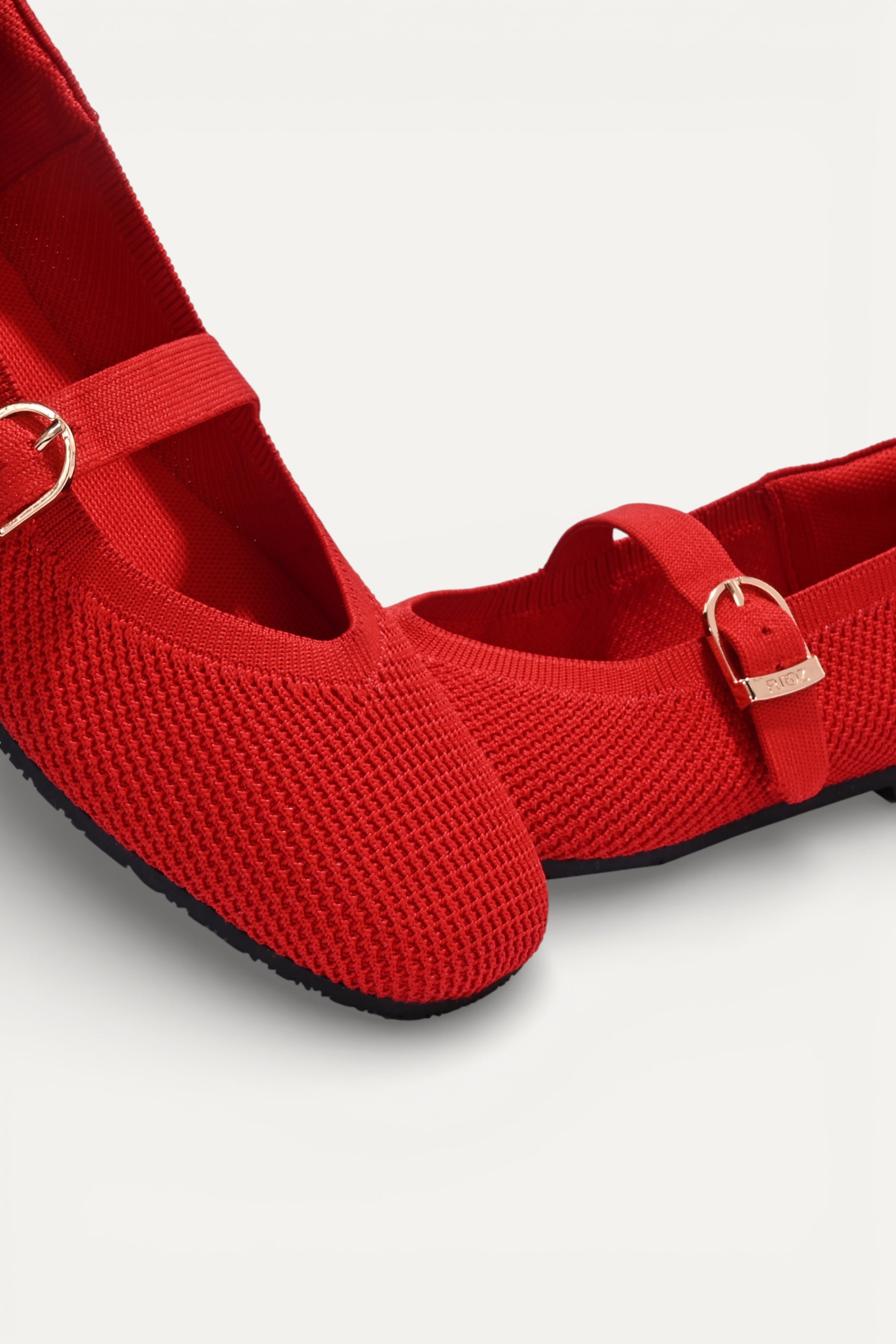 Rioz Red textured knit Mary Jane flats for women with gold buckle strap , eco-friendly fabric and cushioned sole 

