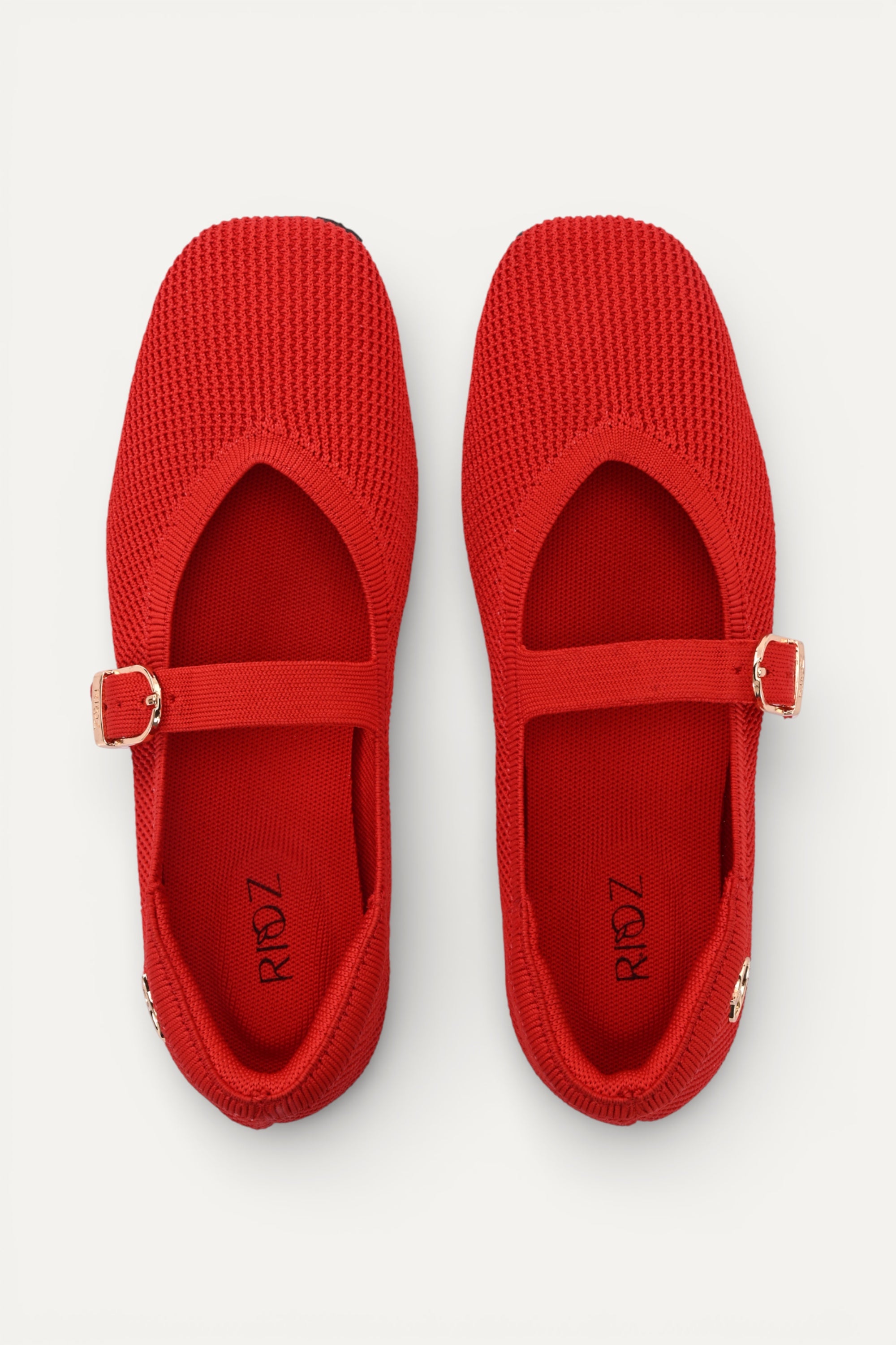 Rioz Red textured knit Mary Jane flats for women with gold buckle strap , eco-friendly fabric and cushioned sole 
