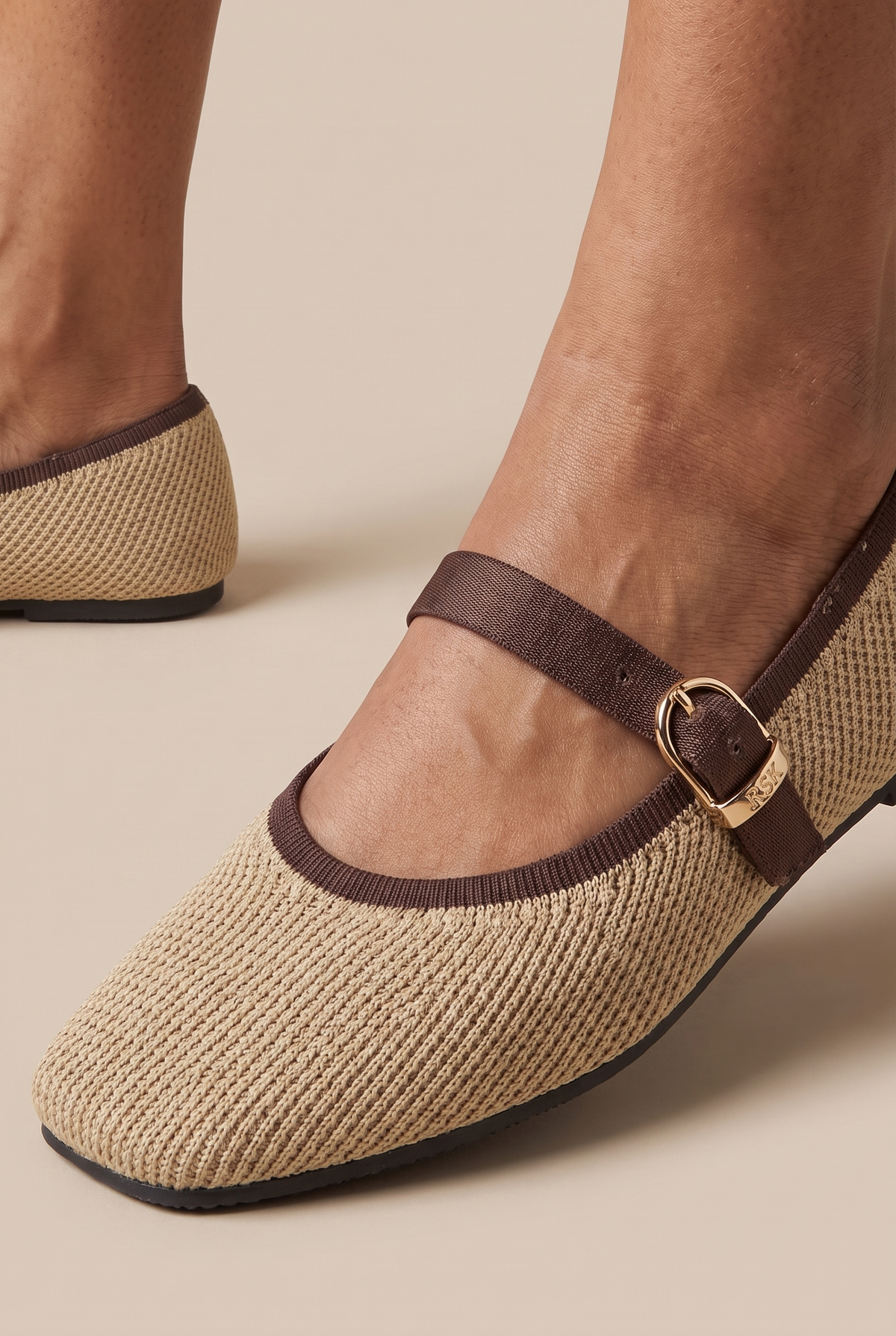 Square Toe Metro Duet Mary Janes Latte foot closeup on Indian woman