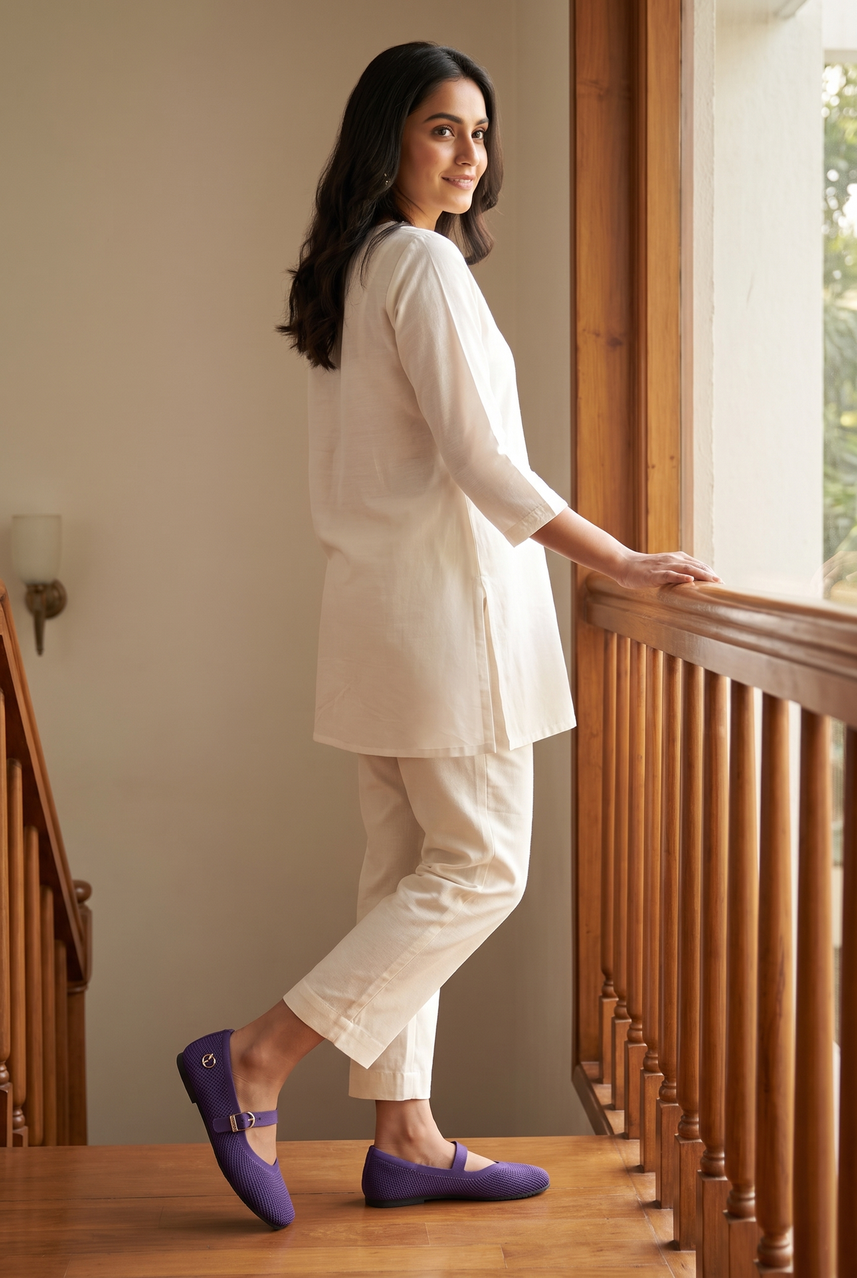The Square Toe Metro Mary Janes Purple full model shot on Indian woman, descending staircase pose