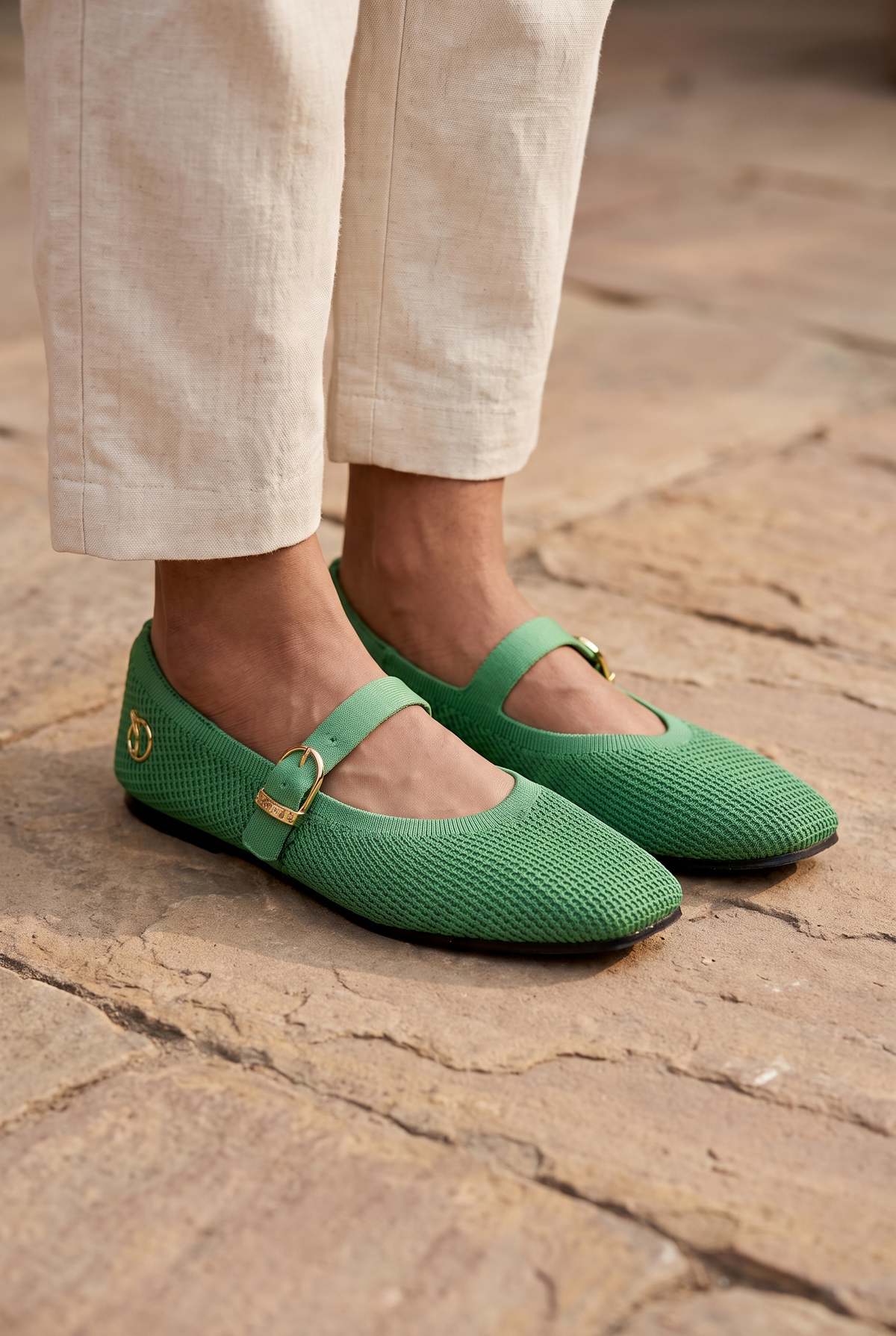 The Square Toe Metro Mary Janes Green foot closeup on Indian woman