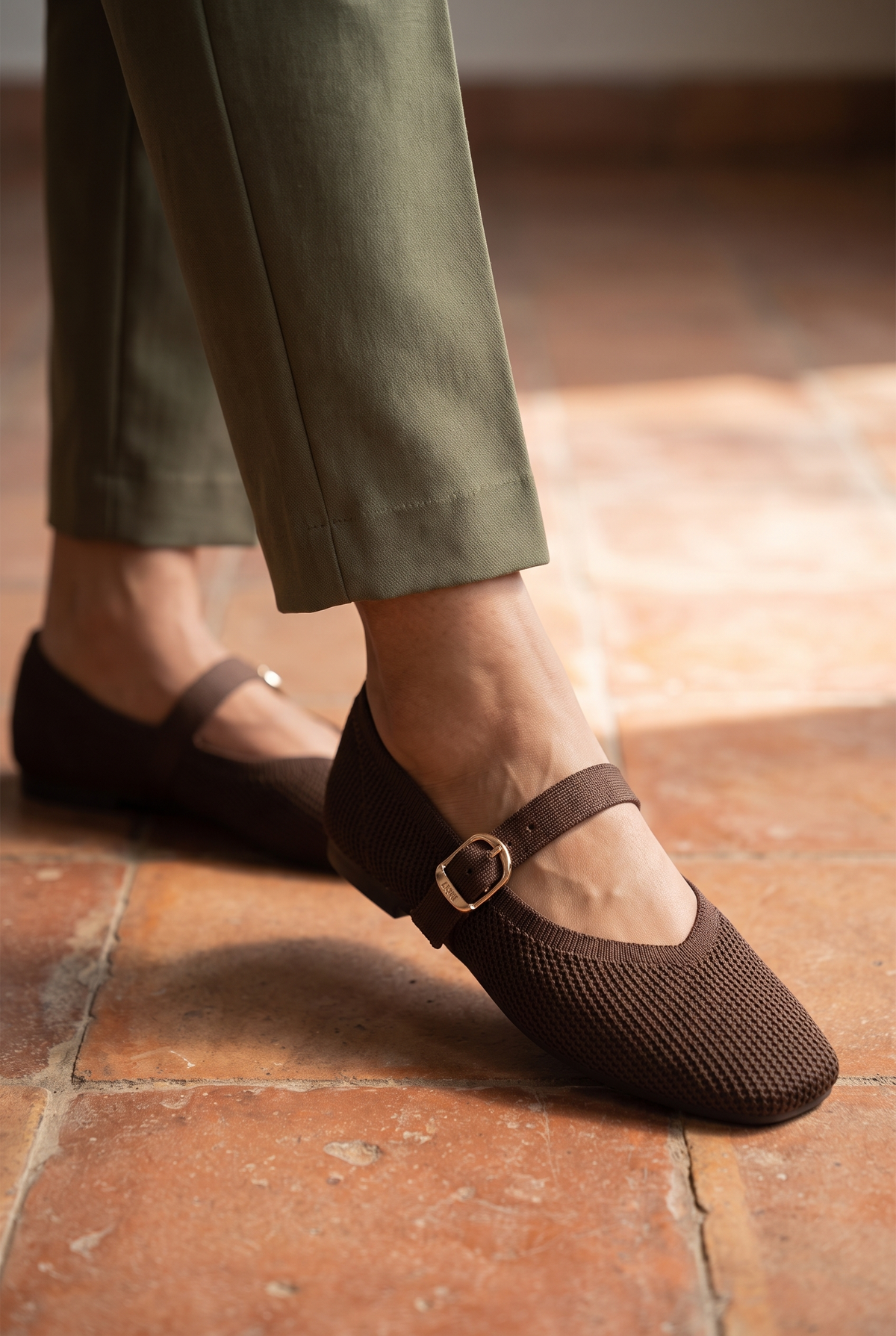 The Square Toe Metro Mary Janes Brown foot closeup on Indian woman