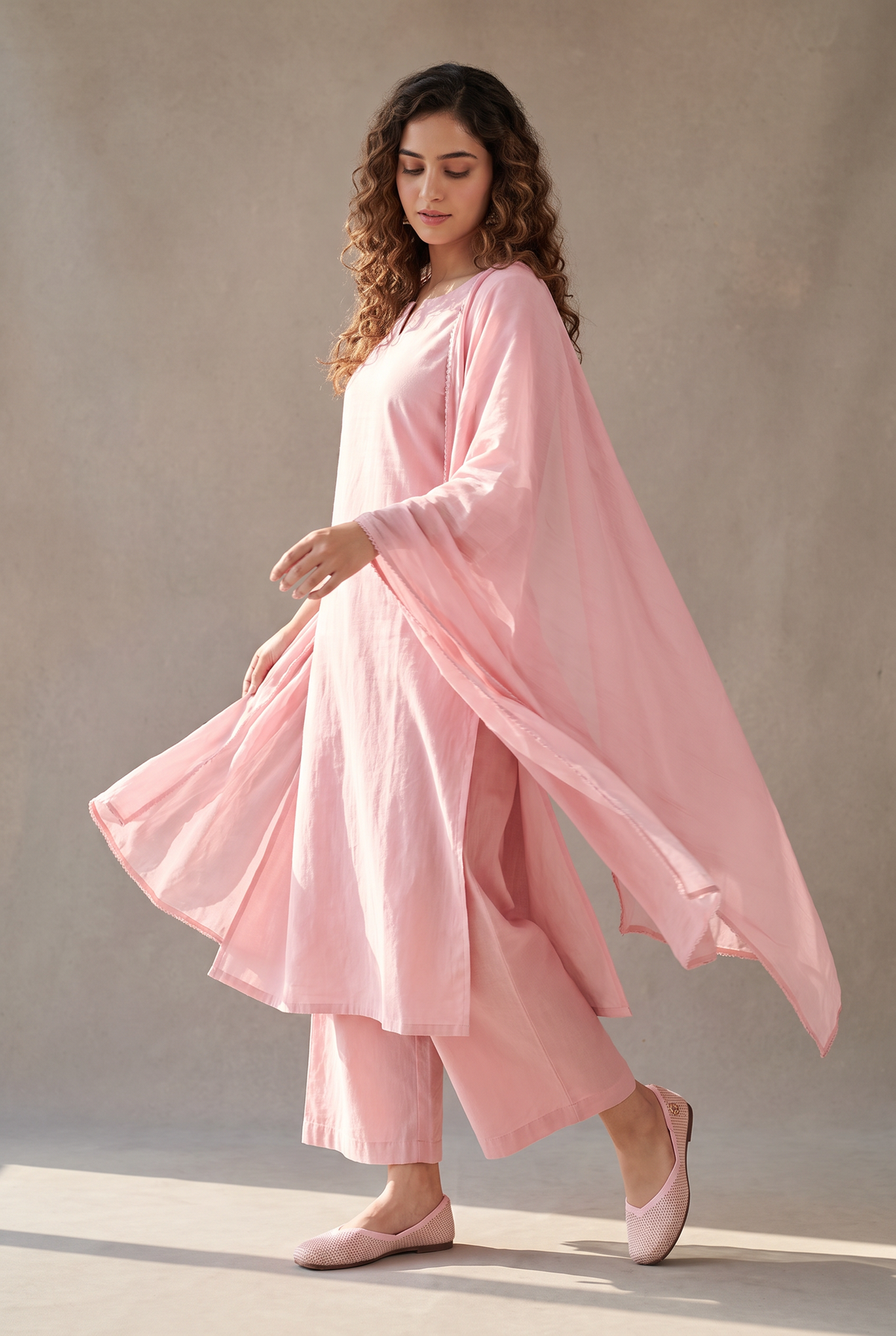 Rioz Sitara pink gold shimmer jutti worn with a tonal pink kurta set